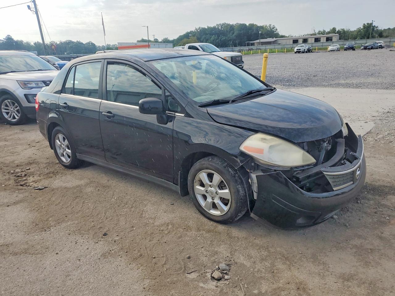 2007 Nissan Versa 1.8 S Черный vin: 3N1BC11E57L411670