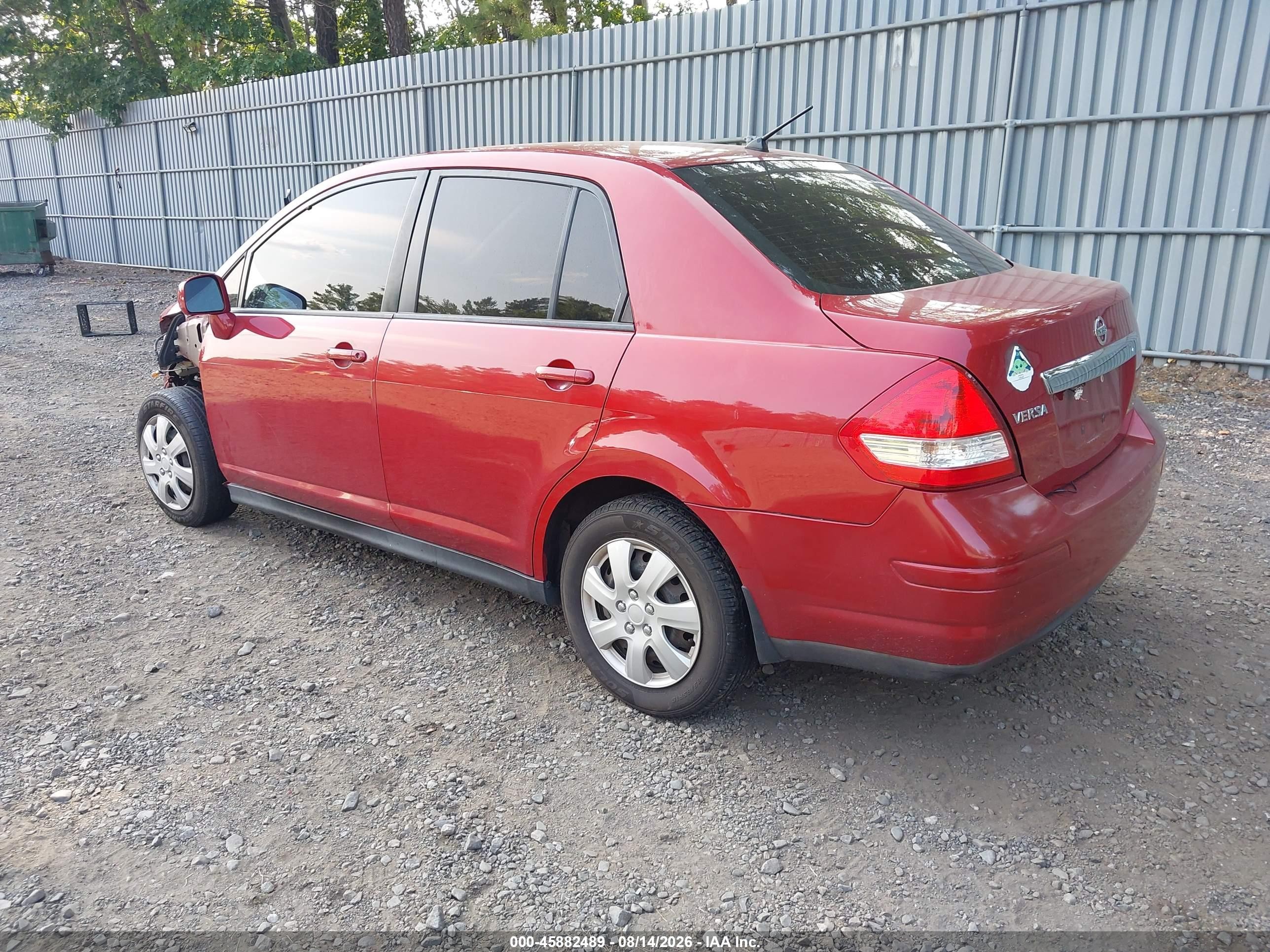 2009 Nissan Versa 1.8s Red vin: 3N1BC11E69L443398