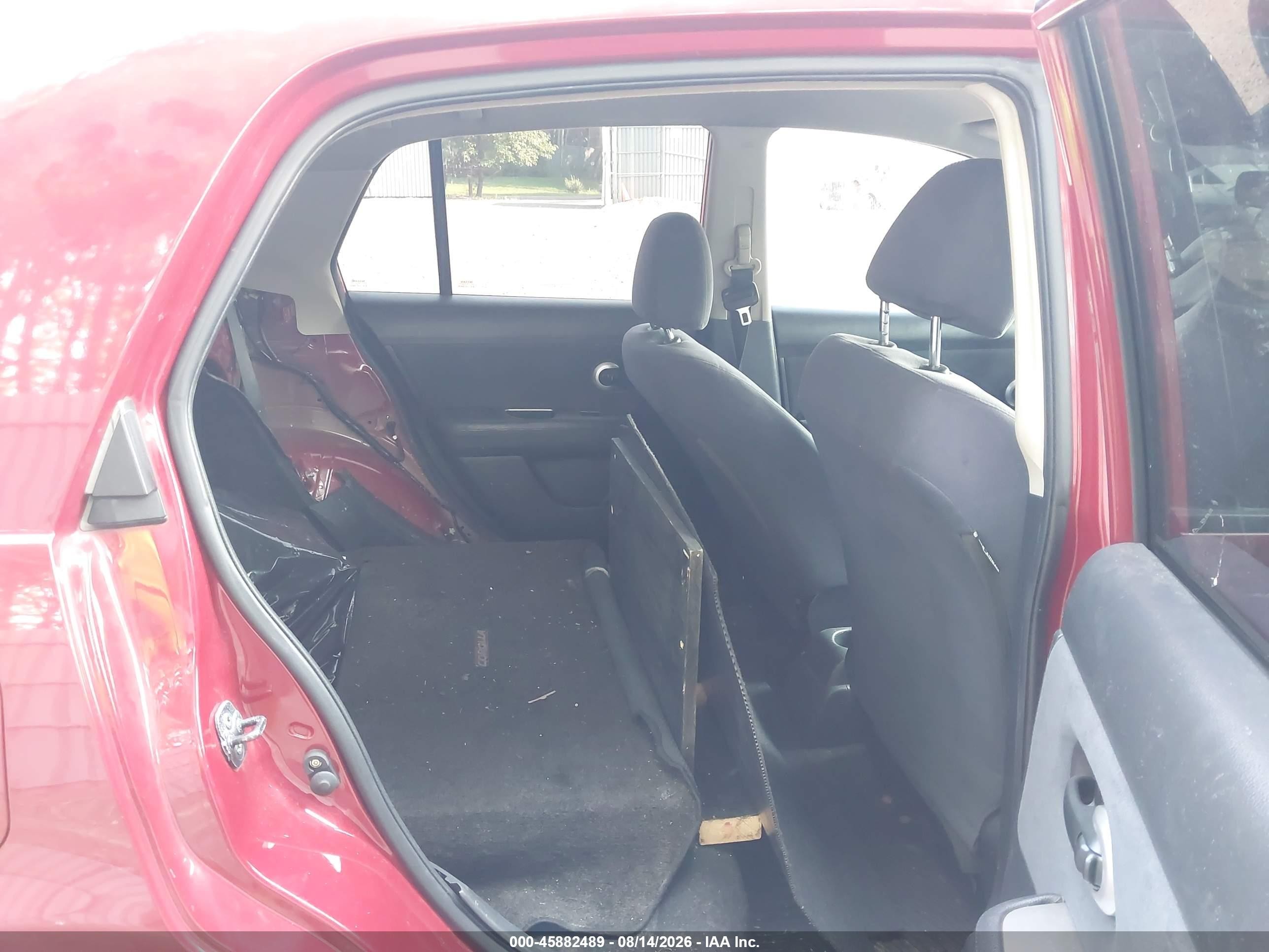 2009 Nissan Versa 1.8s Red vin: 3N1BC11E69L443398