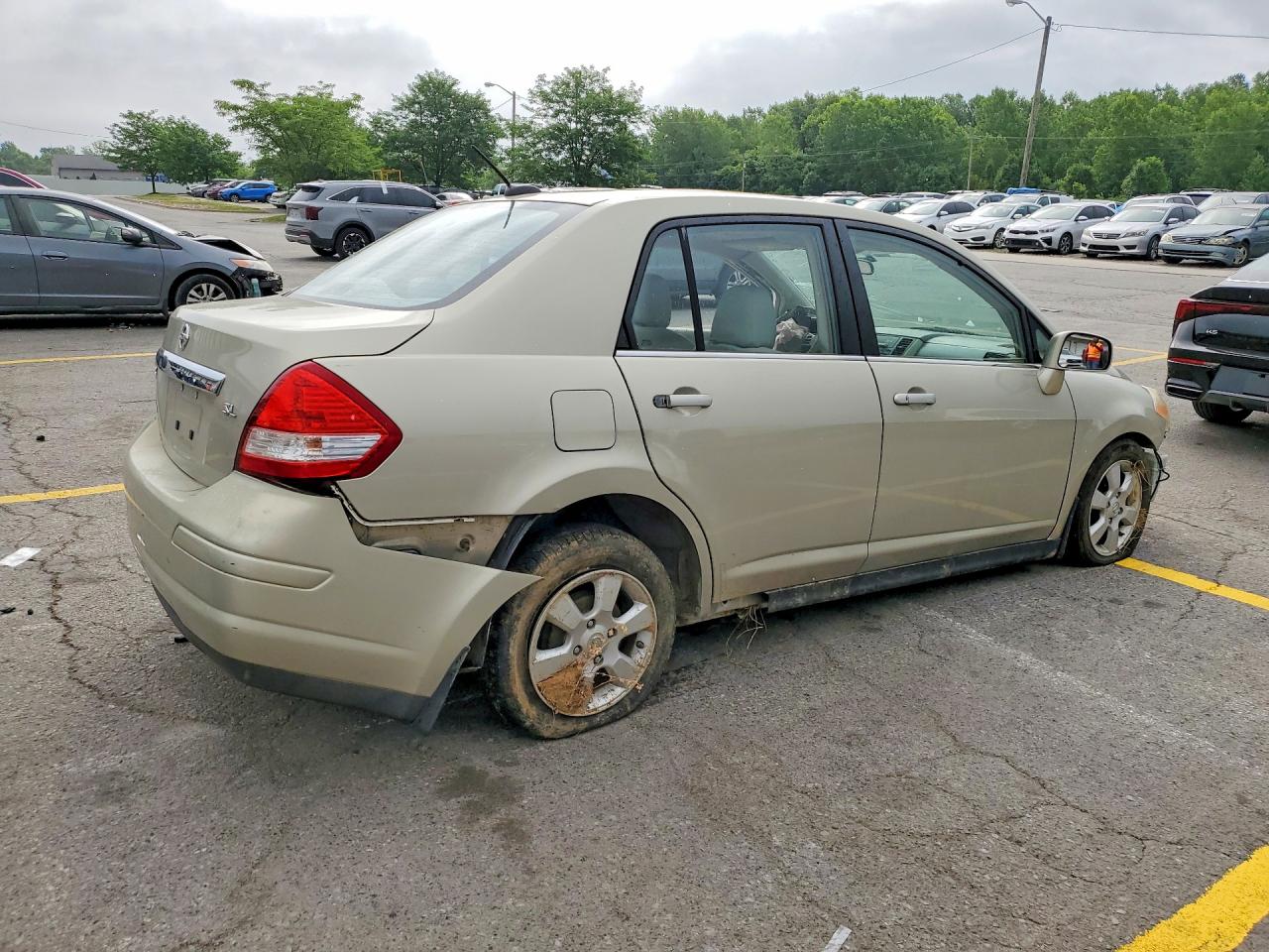 2007 Nissan Versa 1.8 S Beige vin: 3N1BC11E77L401528