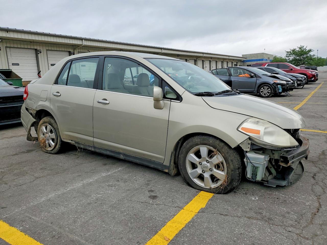 2007 Nissan Versa 1.8 S Beige vin: 3N1BC11E77L401528