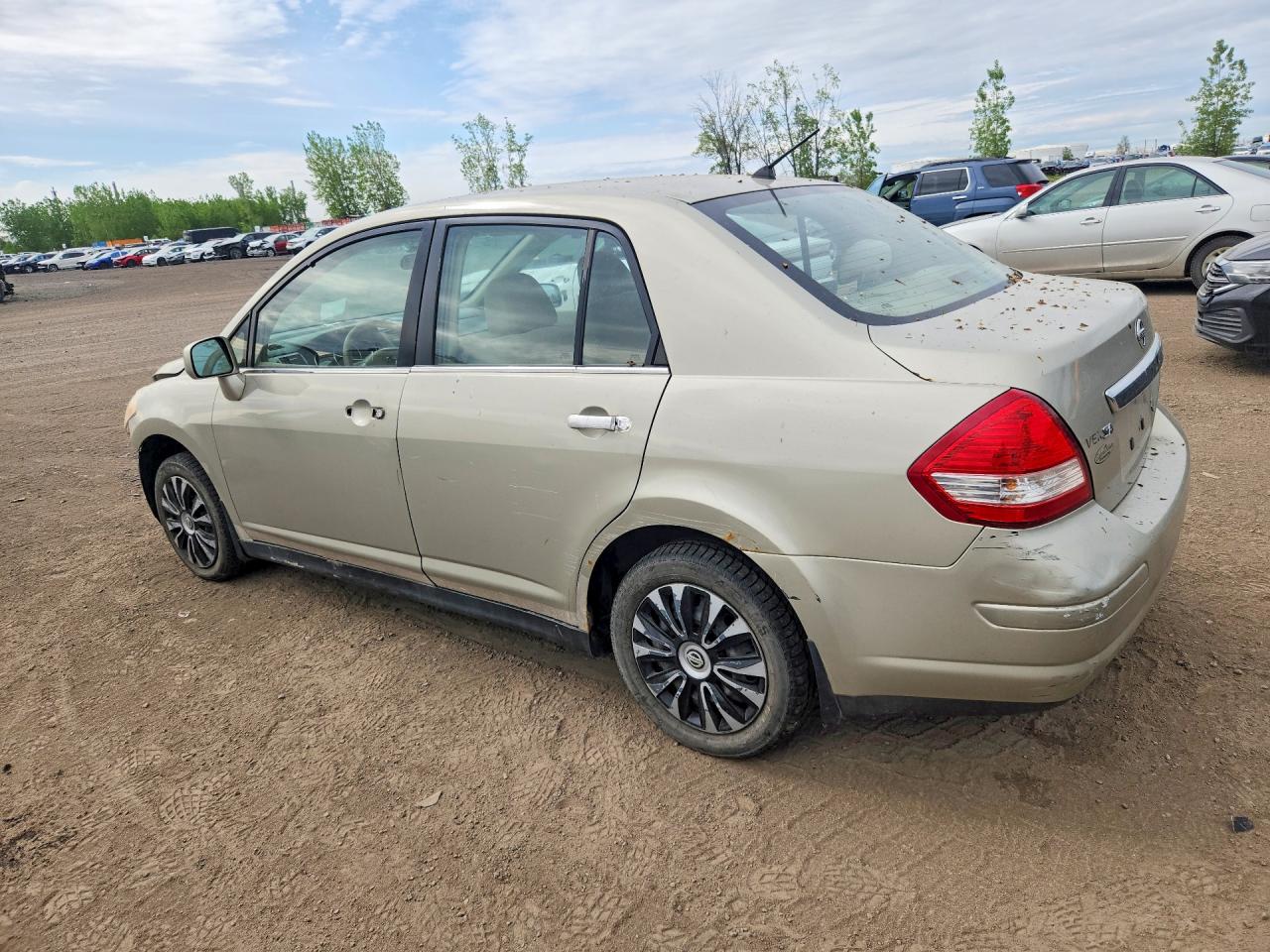 2007 Nissan Versa 1.8 S Beige vin: 3N1BC11E77L441902