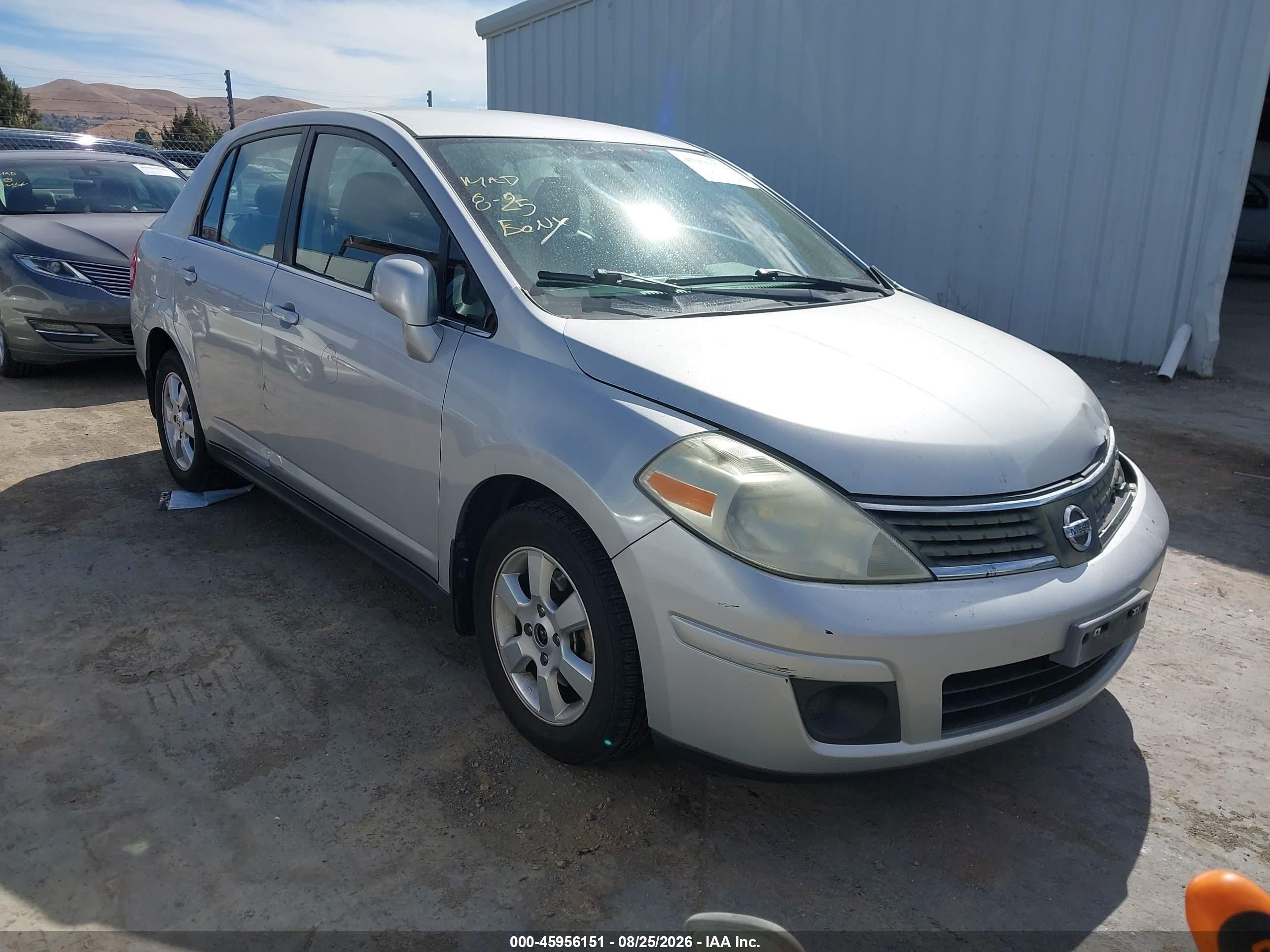 2009 Nissan Versa 1.8sl Silver vin: 3N1BC11E79L351975