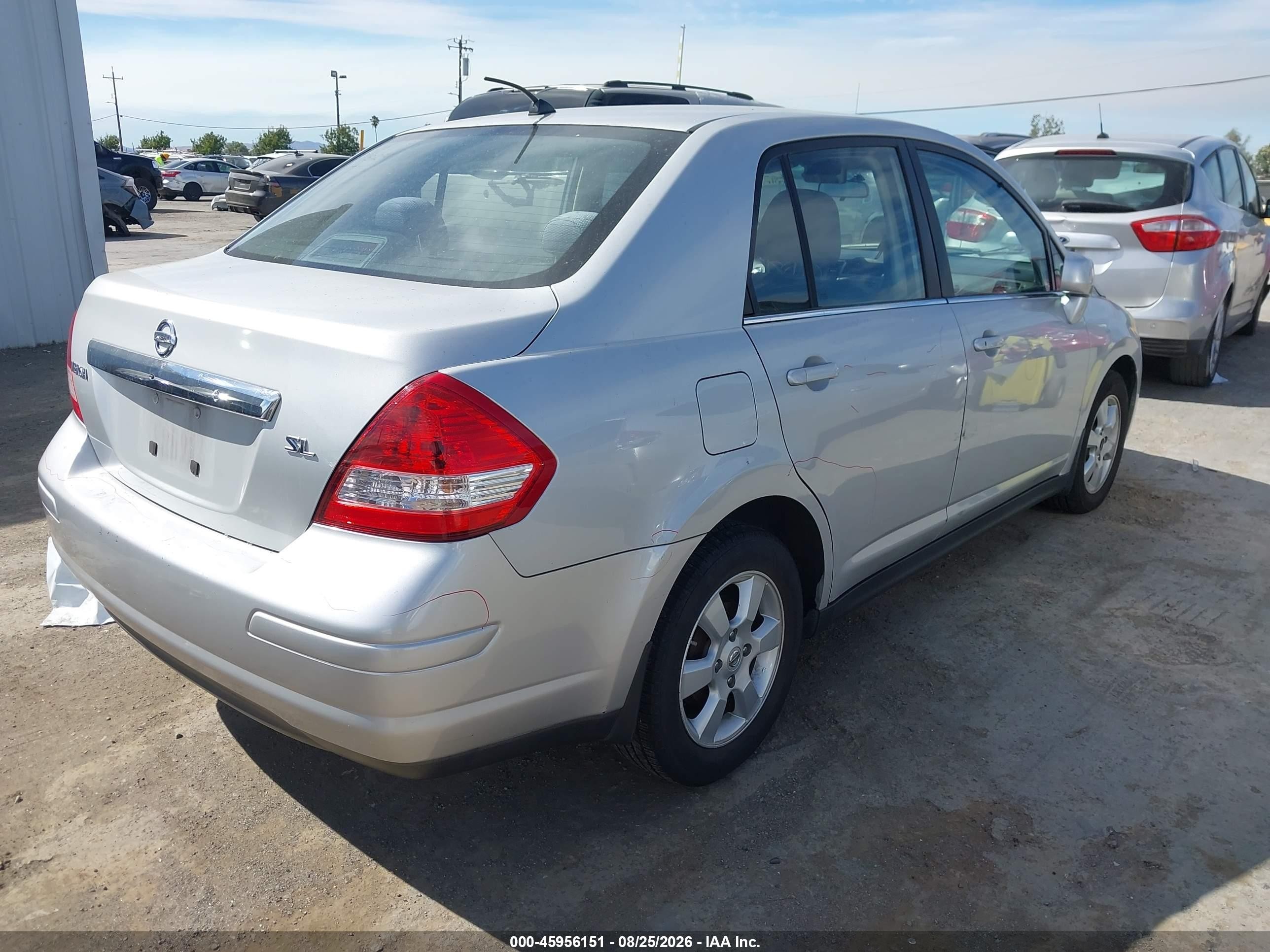 2009 Nissan Versa 1.8sl Silver vin: 3N1BC11E79L351975