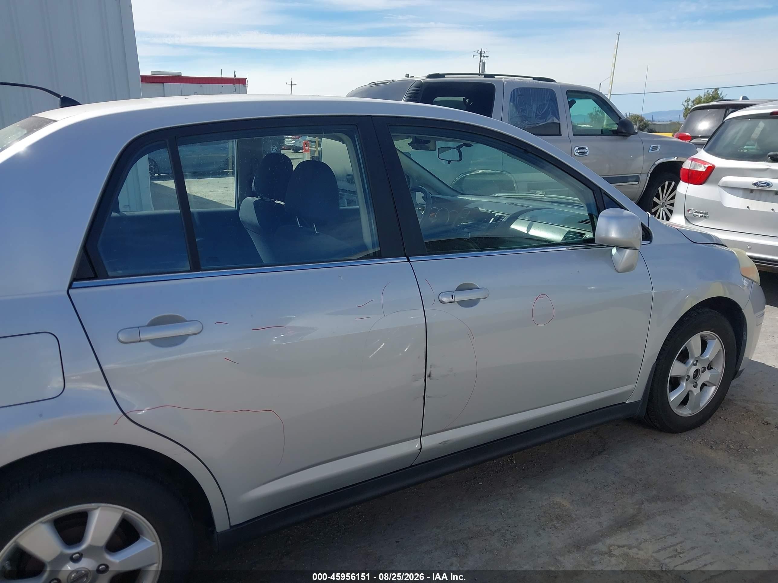 2009 Nissan Versa 1.8sl Silver vin: 3N1BC11E79L351975