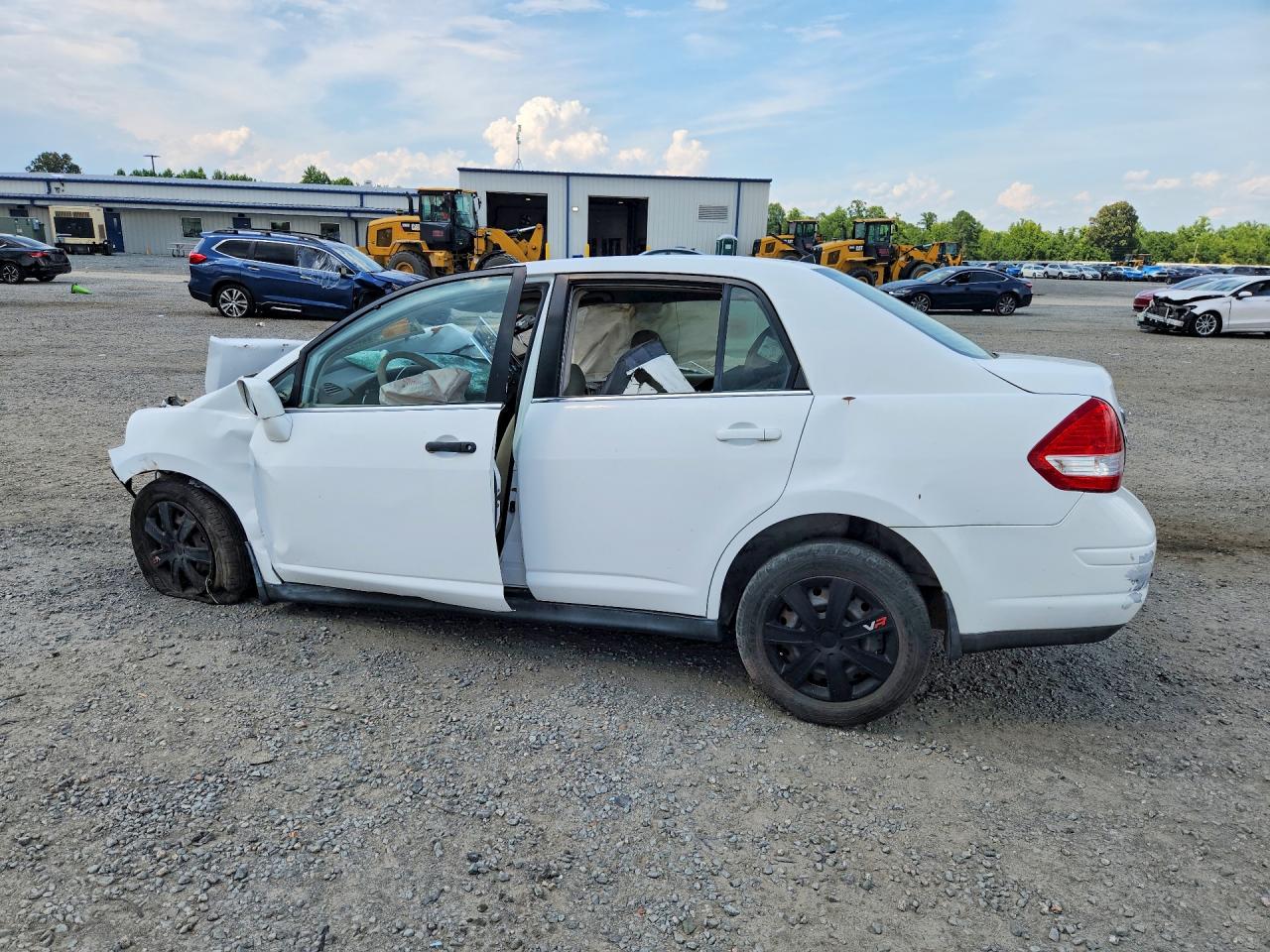 2009 Nissan Versa 1.8 S Белый vin: 3N1BC11E89L372527