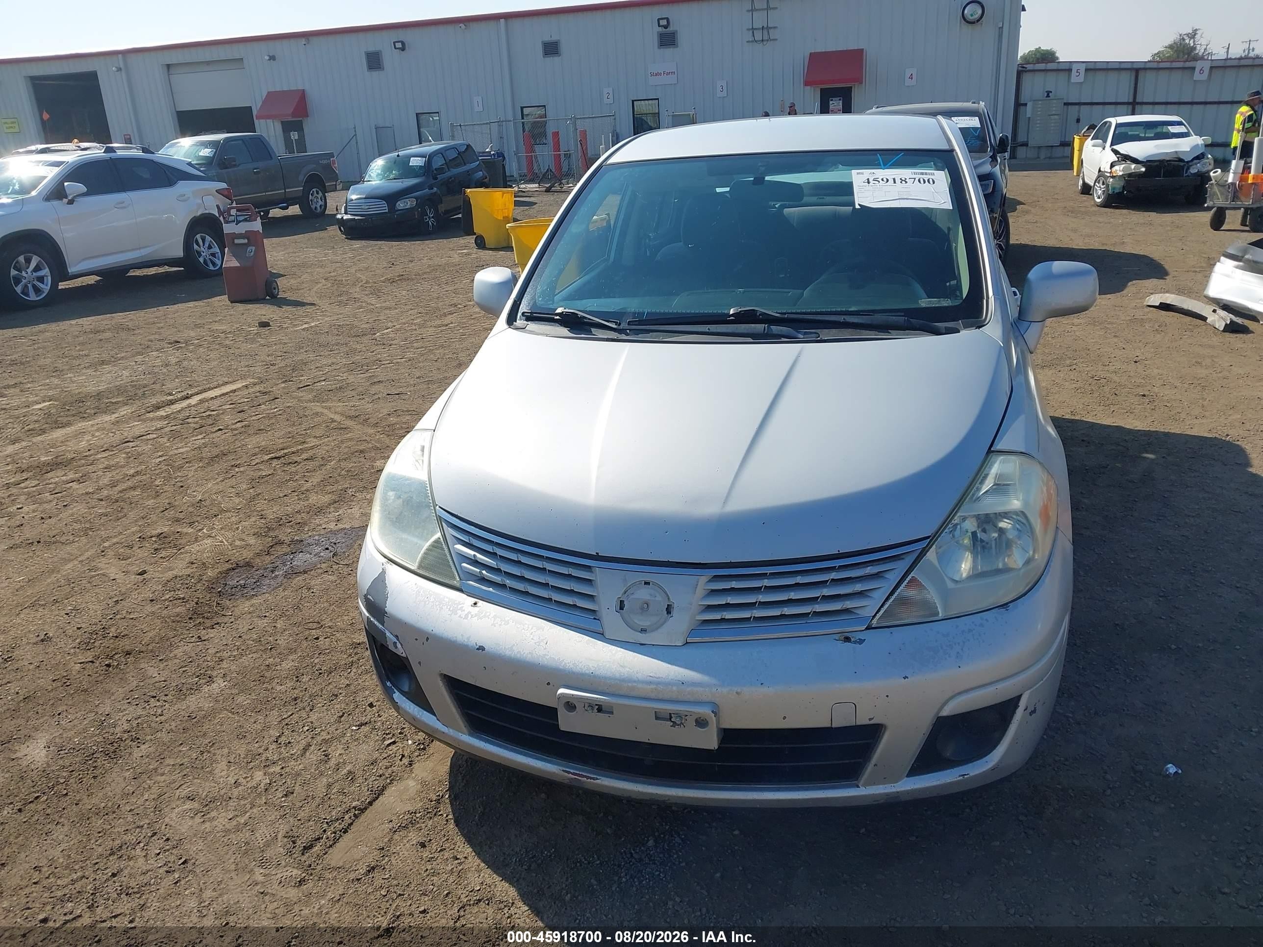 2009 Nissan Versa 1.8s Silver vin: 3N1BC11E89L383642
