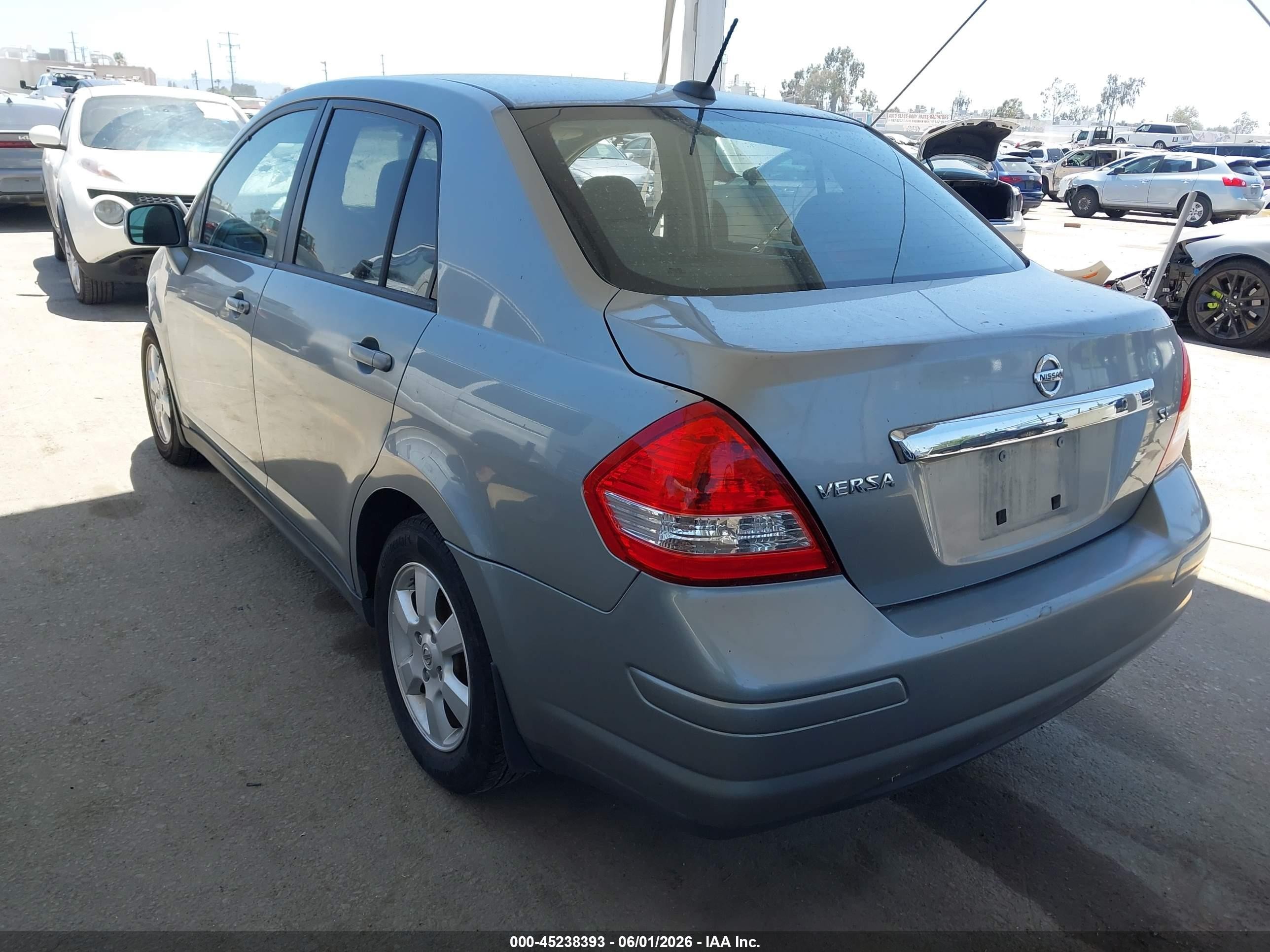 2009 Nissan Versa 1.8sl Silver vin: 3N1BC11E89L390669