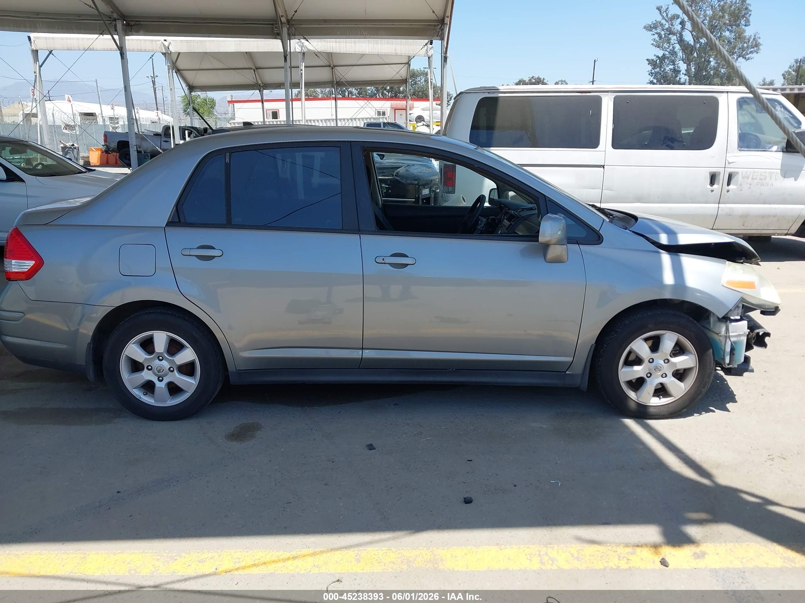 2009 Nissan Versa 1.8sl Silver vin: 3N1BC11E89L390669