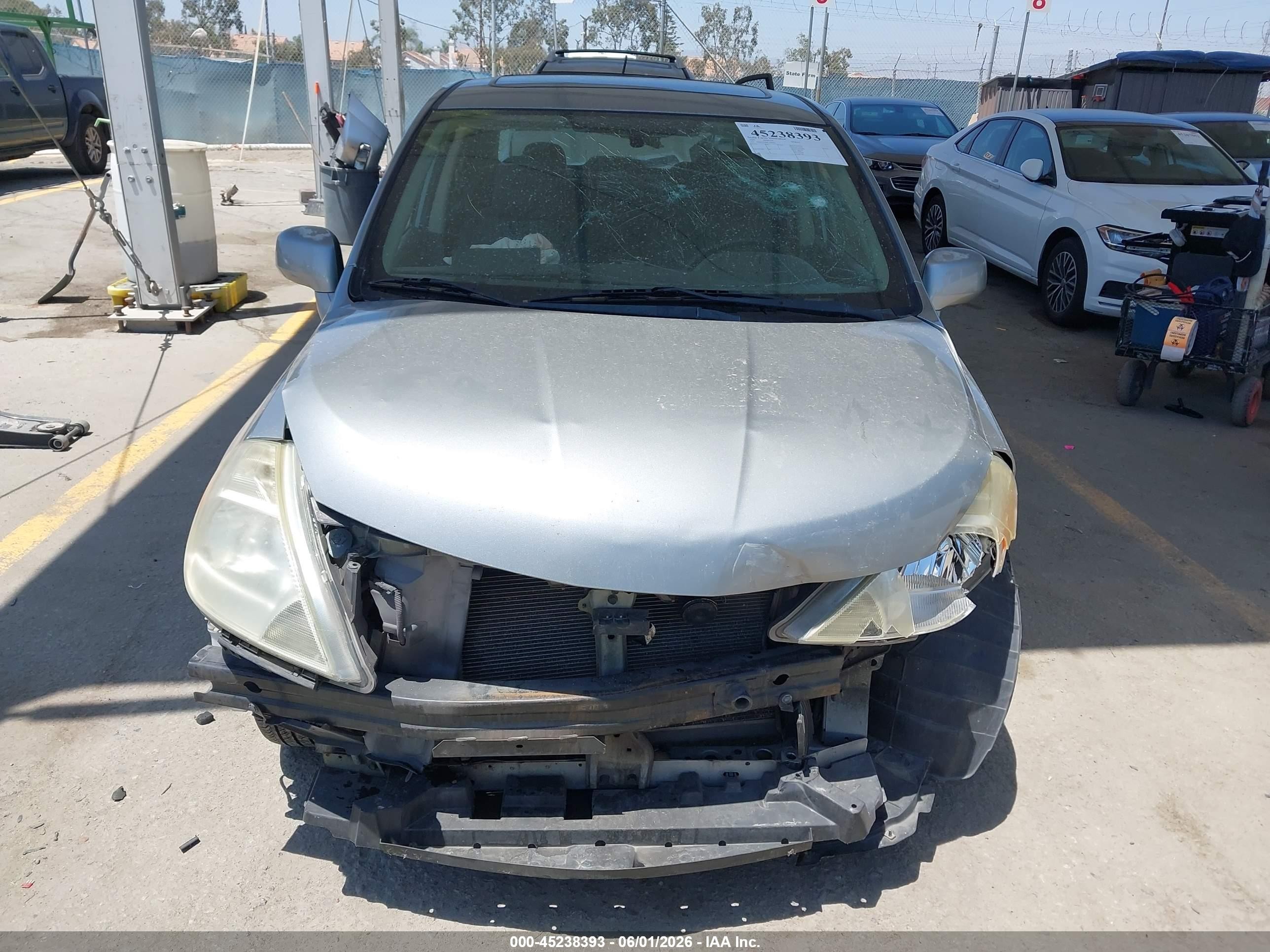 2009 Nissan Versa 1.8sl Silver vin: 3N1BC11E89L390669