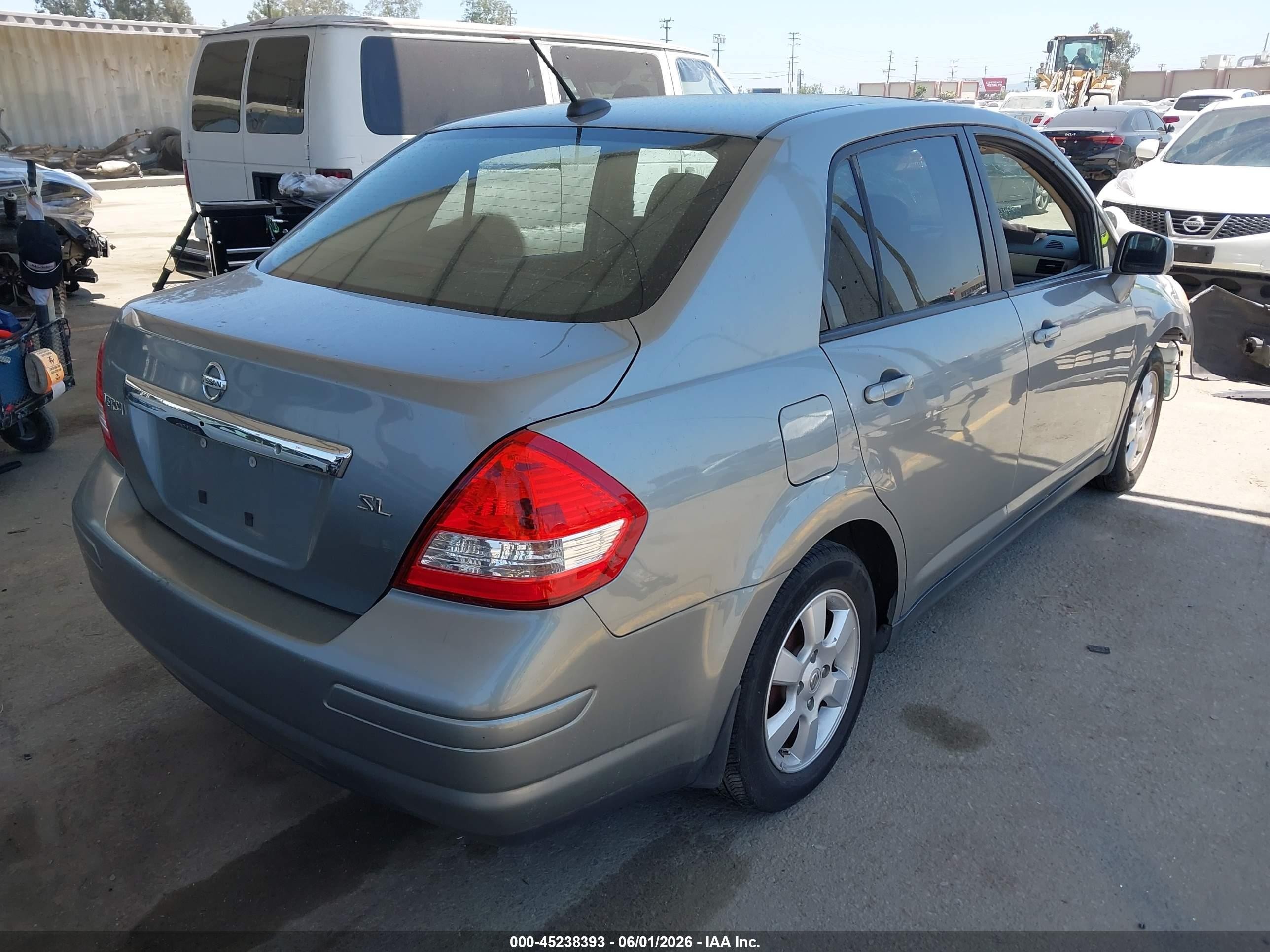 2009 Nissan Versa 1.8sl Silver vin: 3N1BC11E89L390669