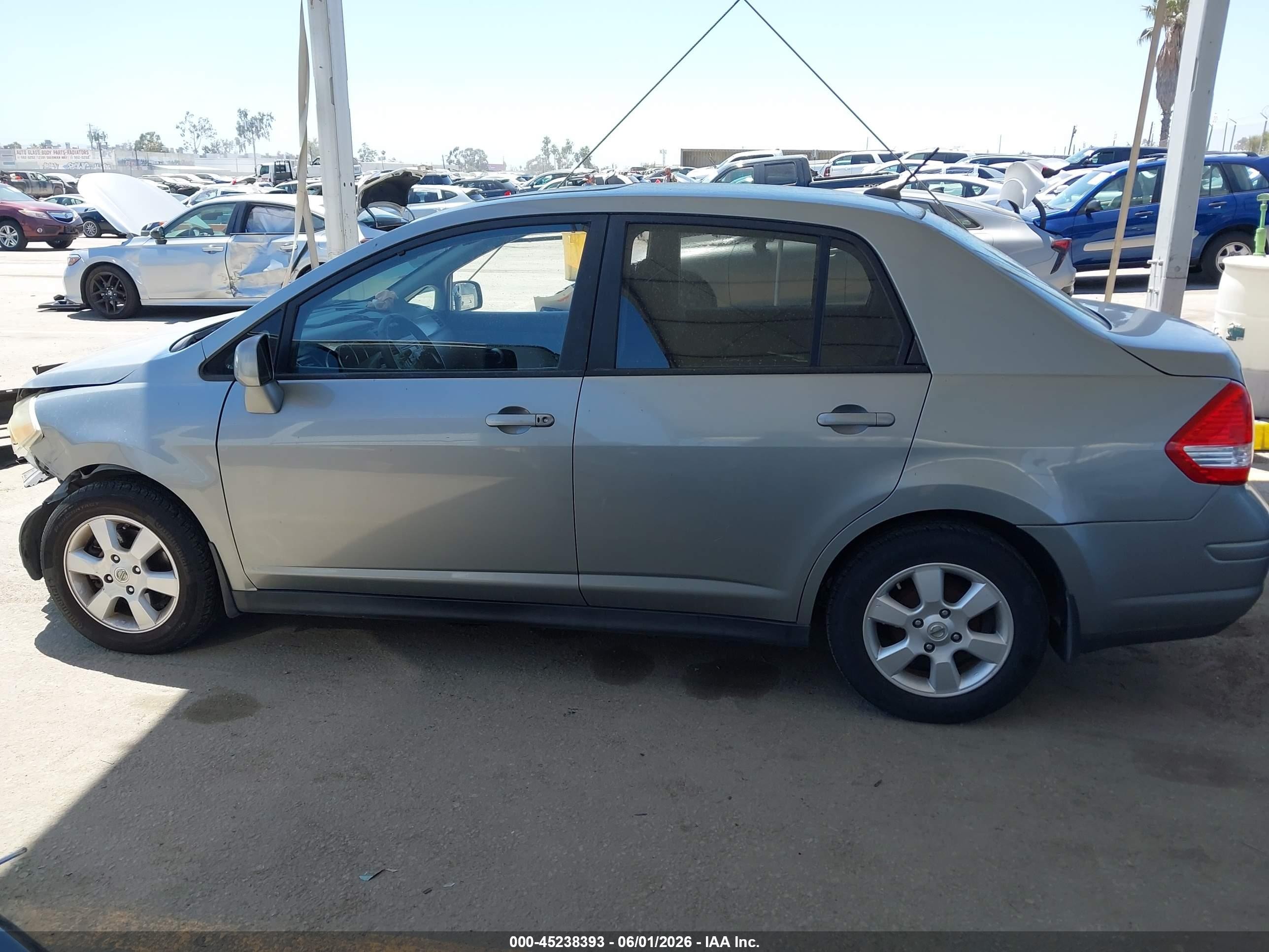 2009 Nissan Versa 1.8sl Silver vin: 3N1BC11E89L390669