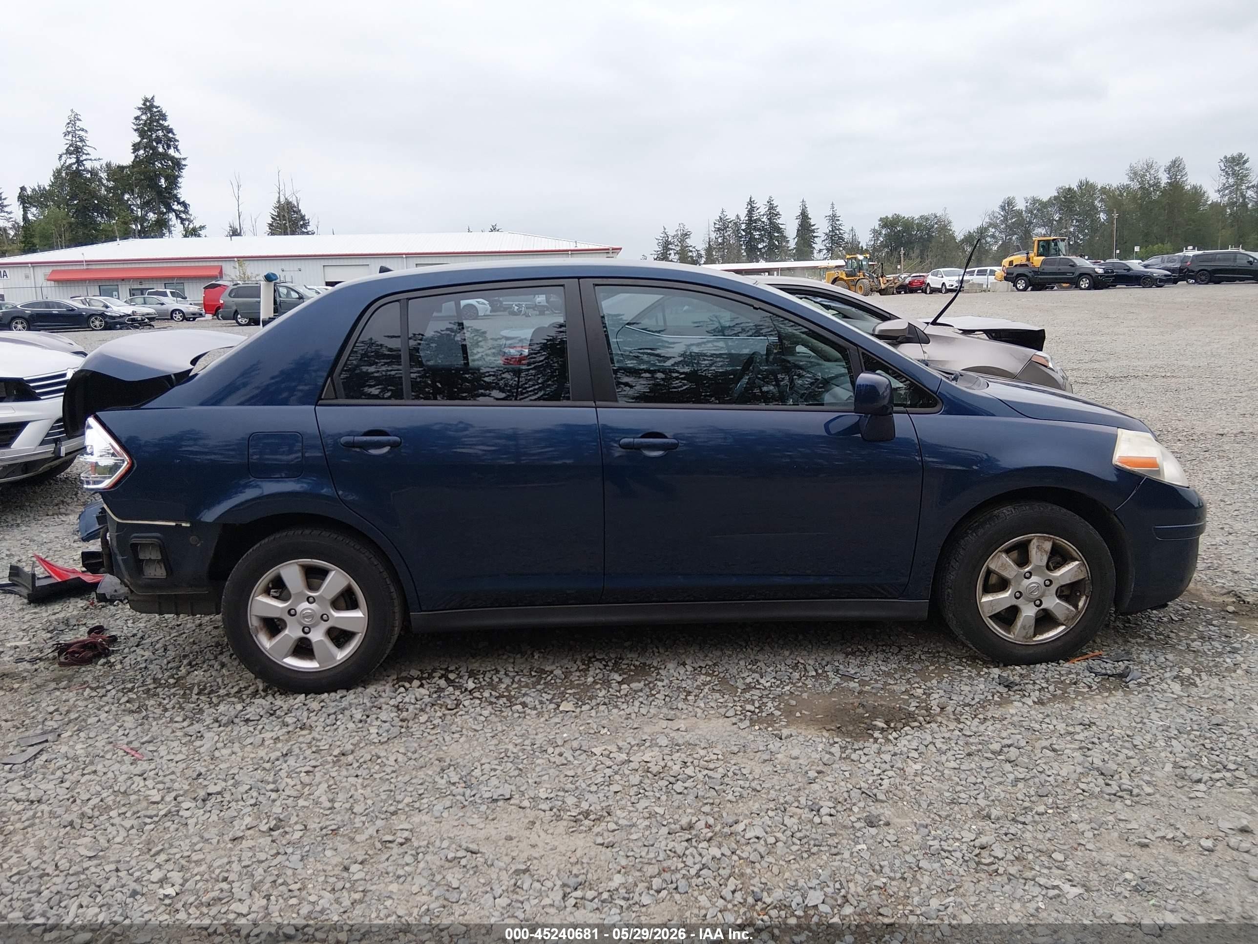 2009 Nissan Versa 1.8sl Blue vin: 3N1BC11E89L484485