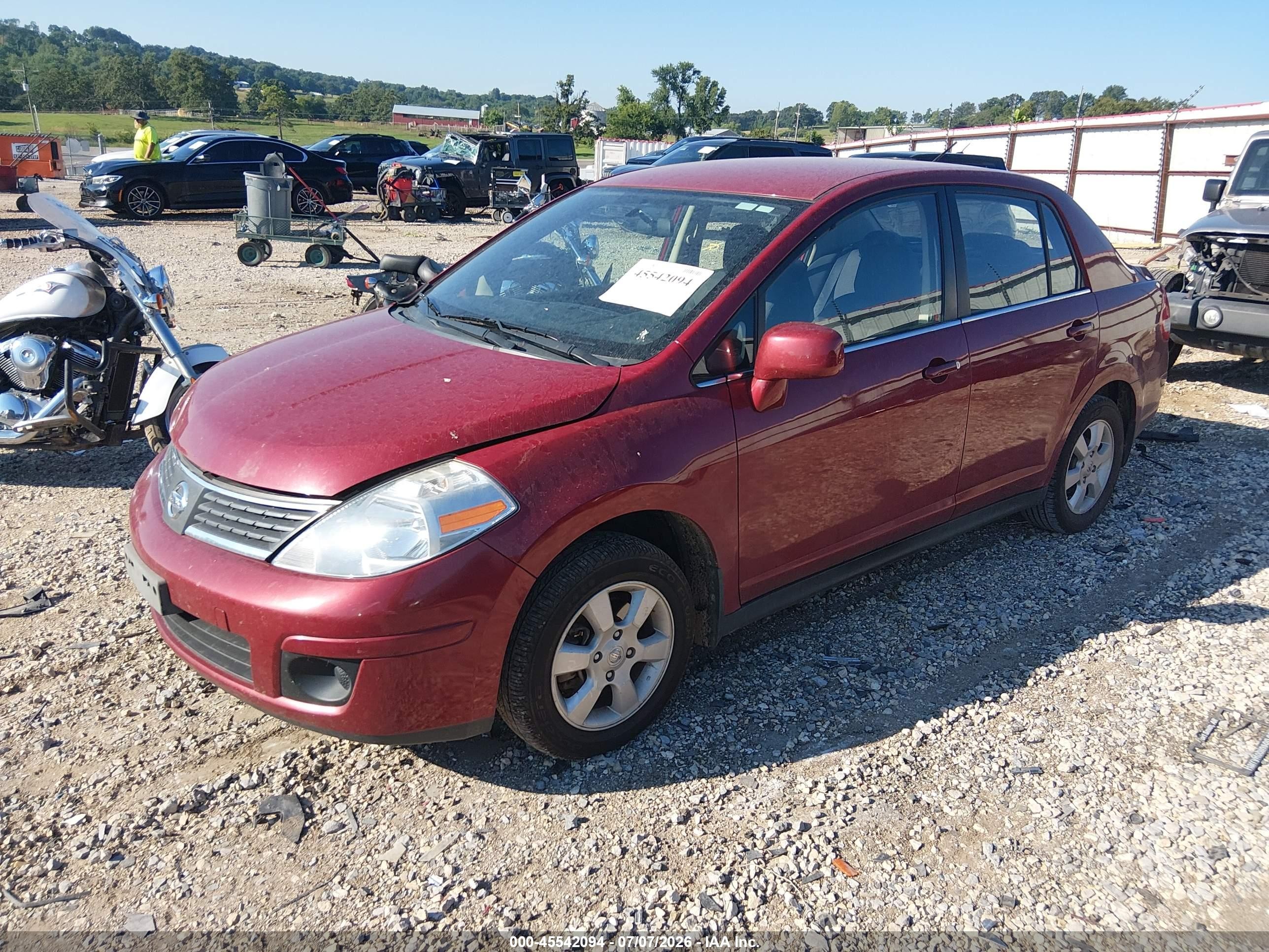 2007 Nissan Versa 1.8sl Maroon vin: 3N1BC11E97L409761