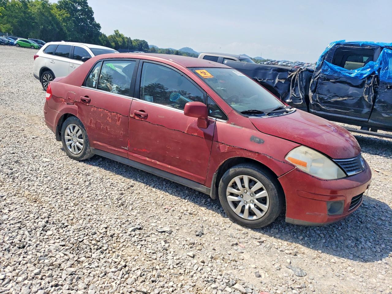 2007 Nissan Versa 1.8 S Red vin: 3N1BC11EX7L398267