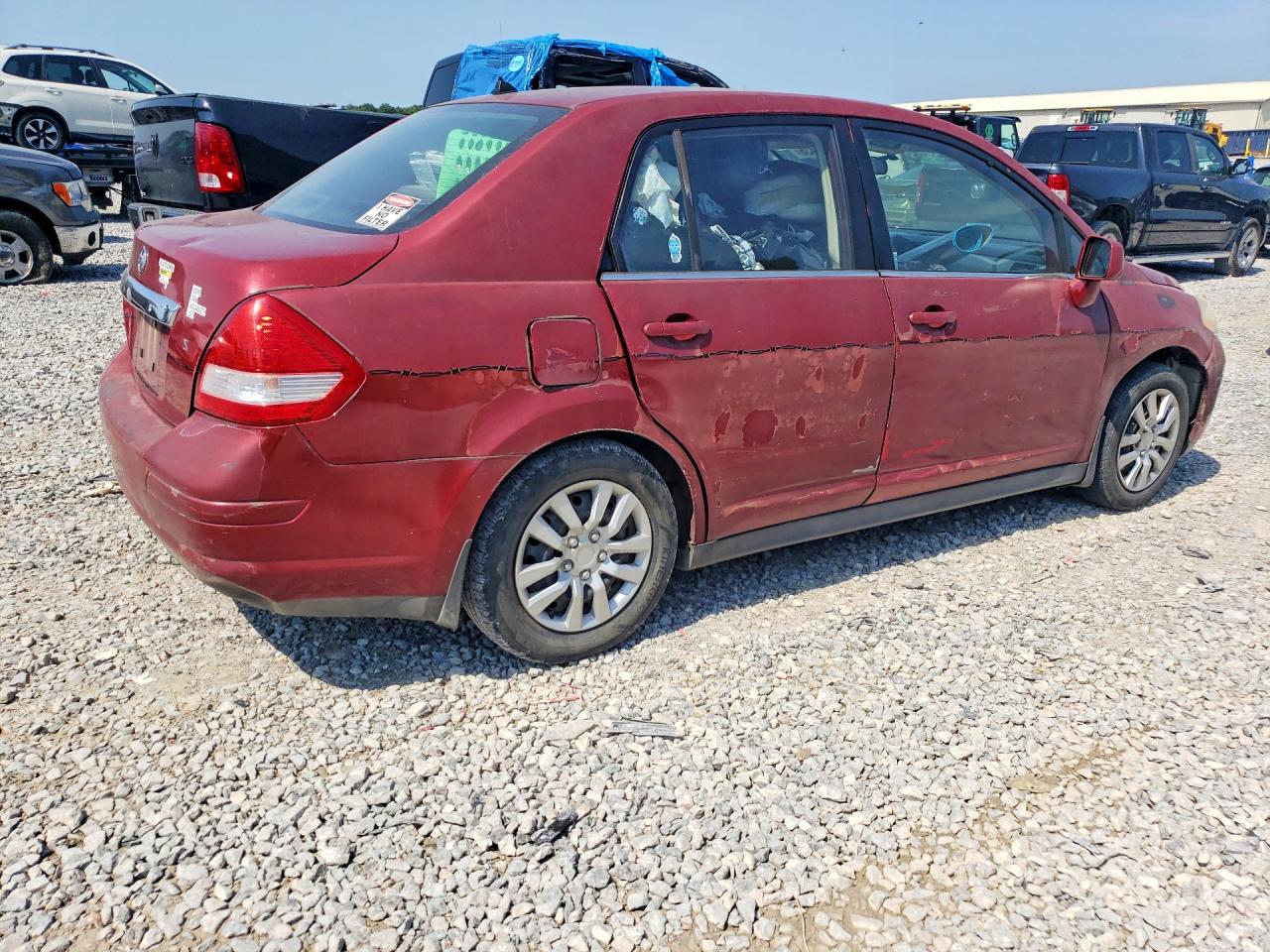 2007 Nissan Versa 1.8 S Red vin: 3N1BC11EX7L398267