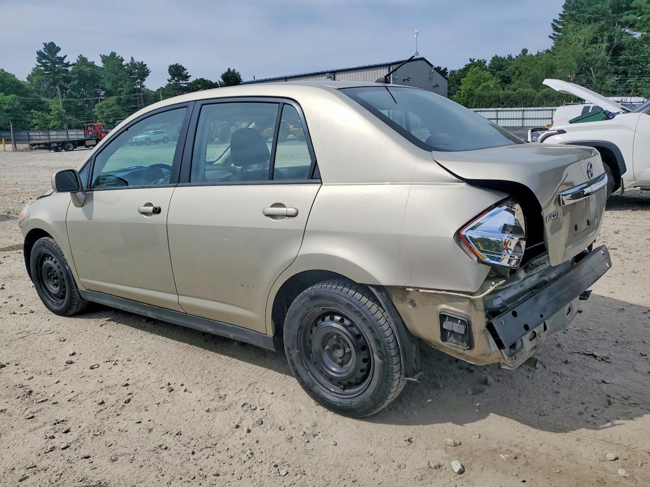 2009 Nissan Versa 1.8 S Beige vin: 3N1BC11EX9L392178