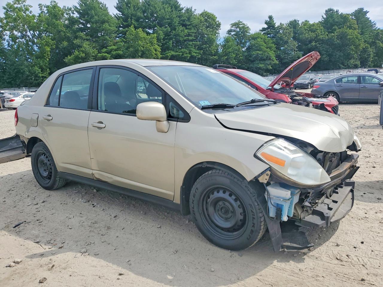2009 Nissan Versa 1.8 S Beige vin: 3N1BC11EX9L392178