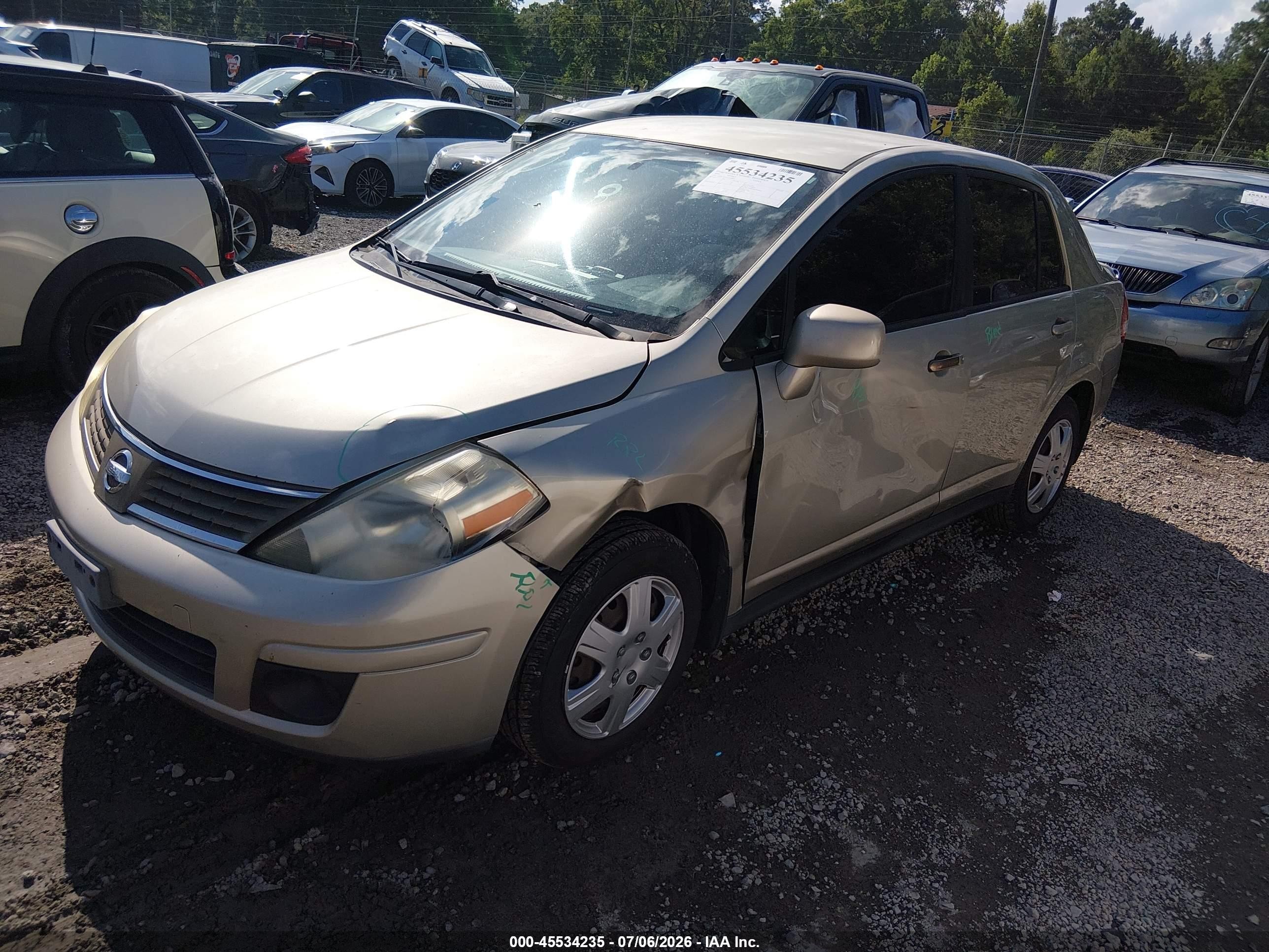 2009 Nissan Versa 1.8s Gold vin: 3N1BC11EX9L449835
