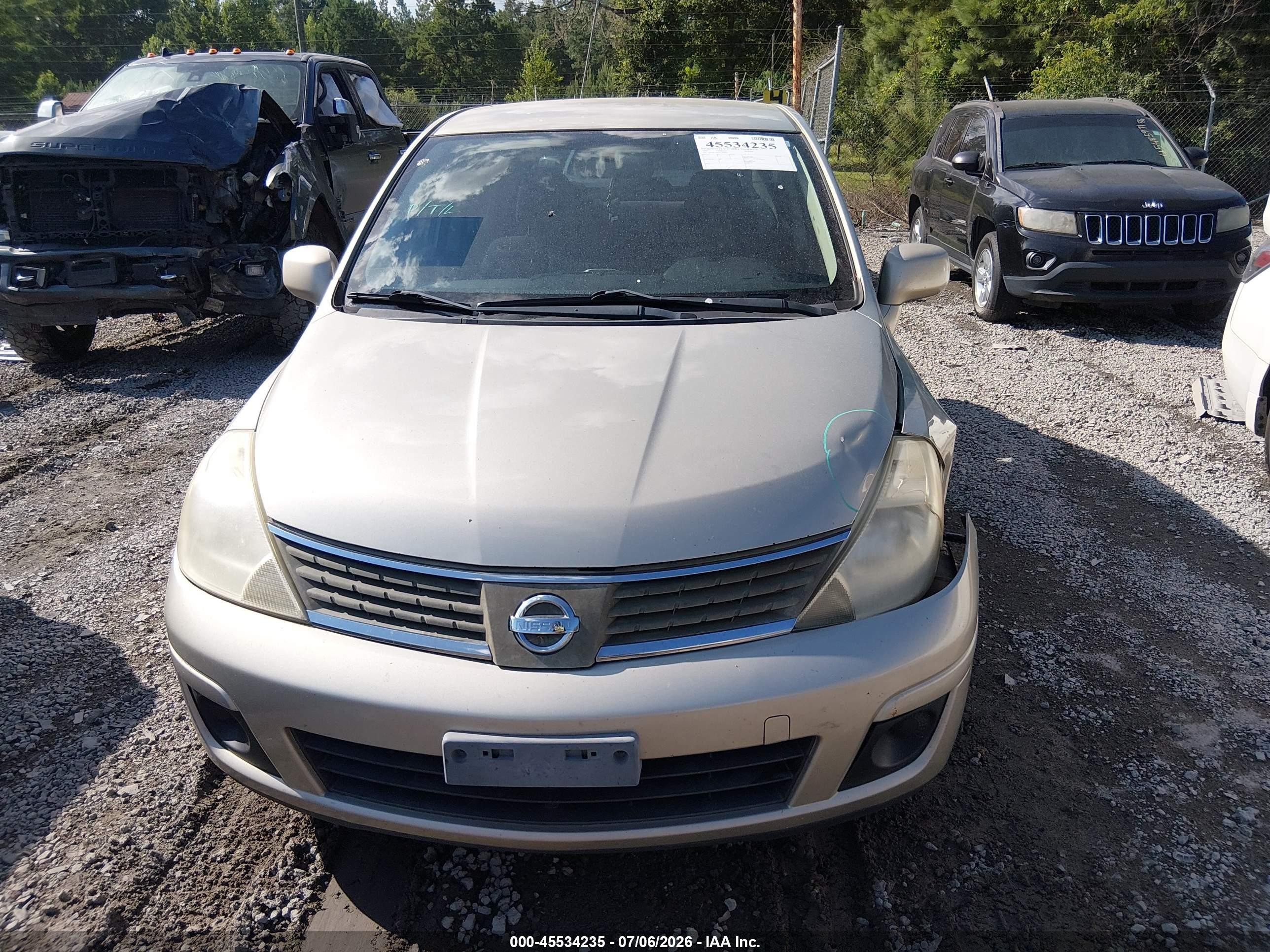 2009 Nissan Versa 1.8s Gold vin: 3N1BC11EX9L449835