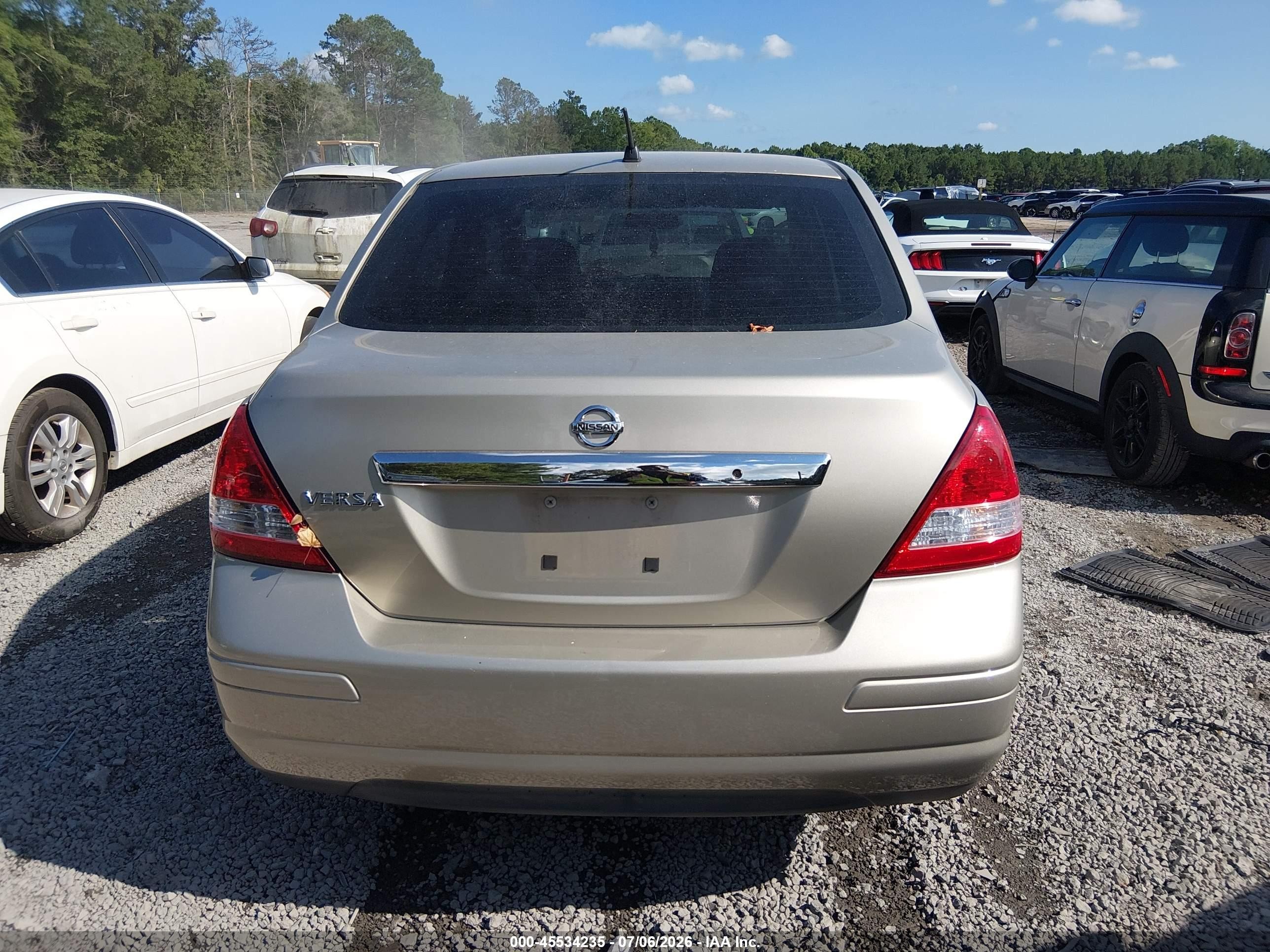 2009 Nissan Versa 1.8s Gold vin: 3N1BC11EX9L449835