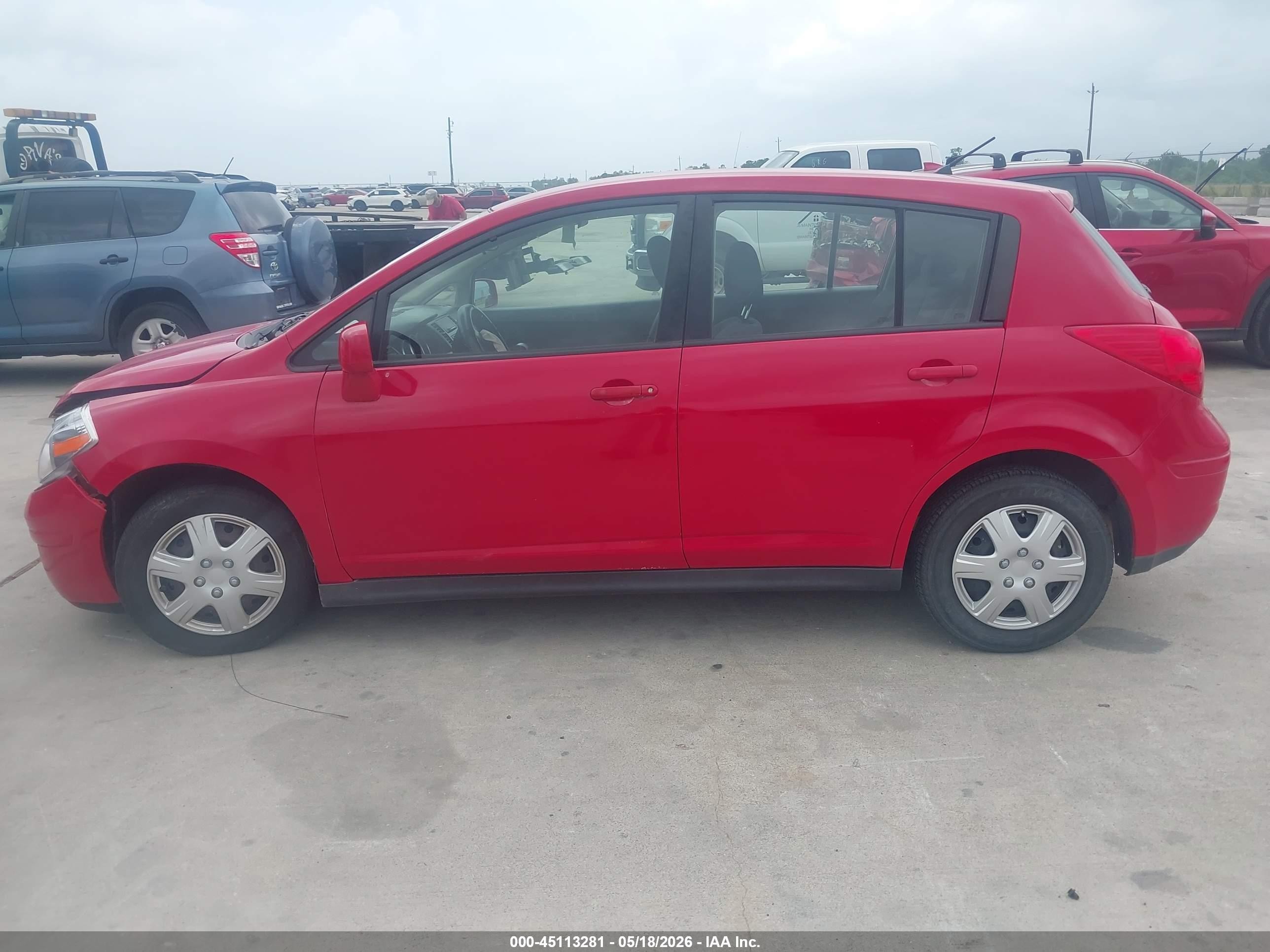 2009 Nissan Versa 1.8s Red vin: 3N1BC13E09L370381