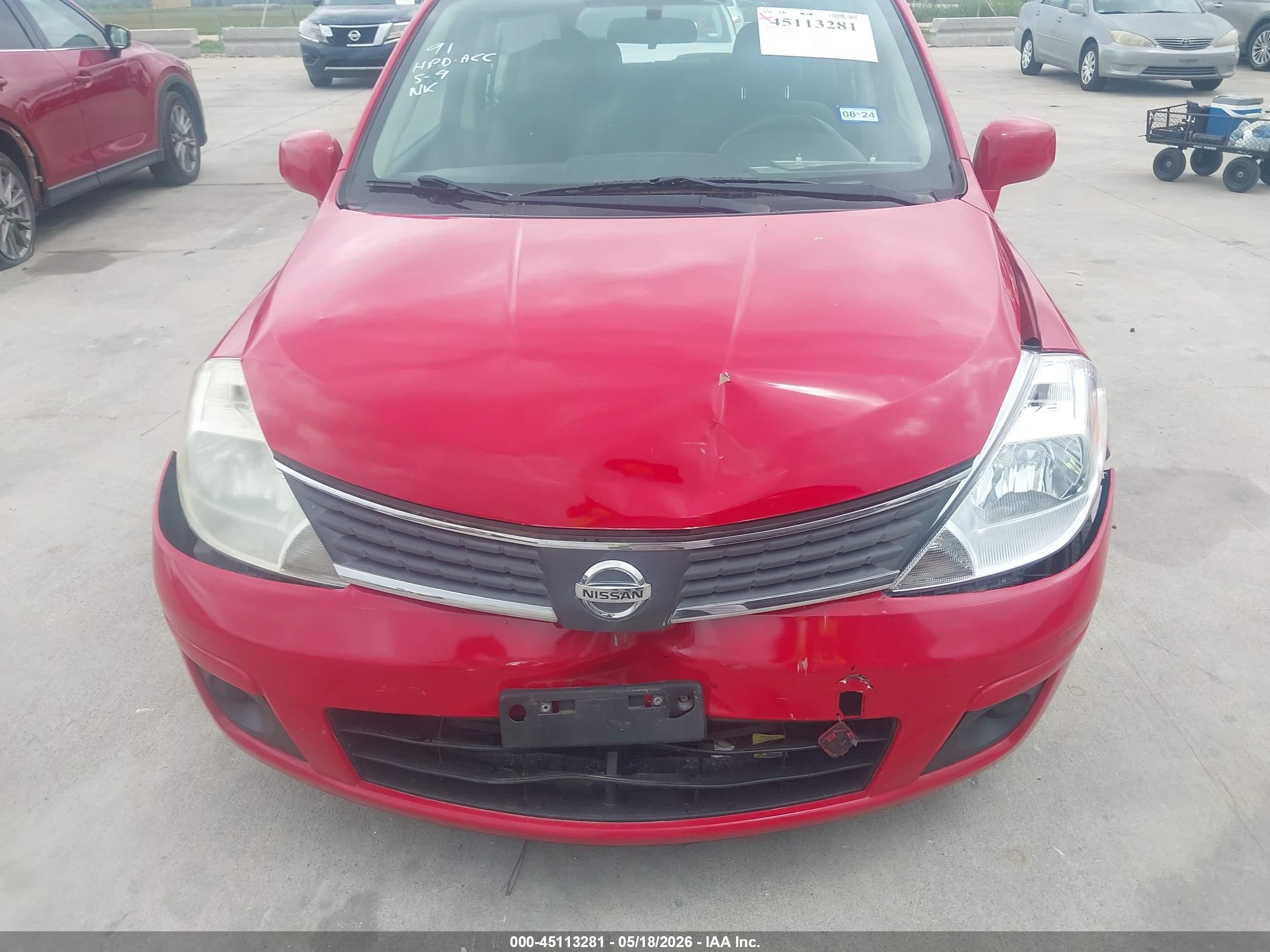 2009 Nissan Versa 1.8s Red vin: 3N1BC13E09L370381