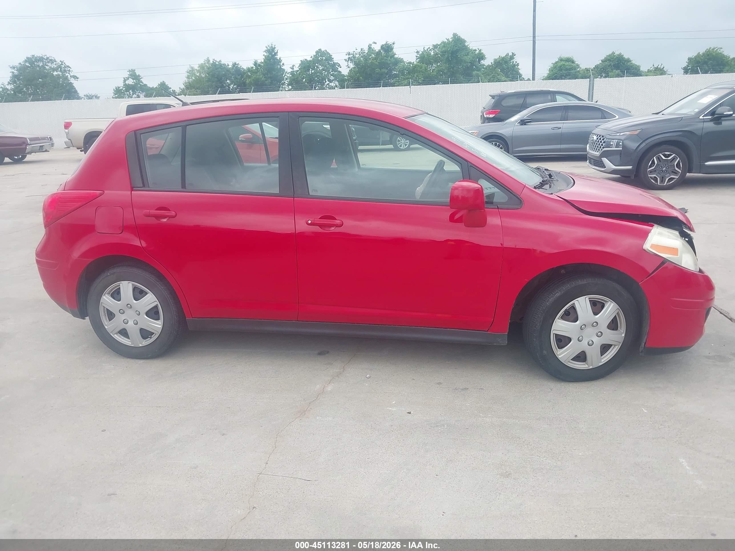 2009 Nissan Versa 1.8s Red vin: 3N1BC13E09L370381