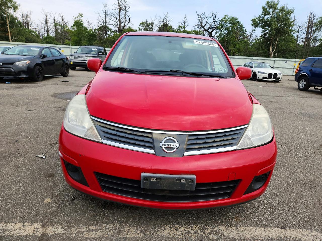 2009 Nissan Versa 1.8 S Red vin: 3N1BC13E19L458775