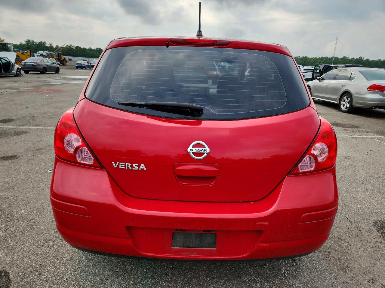 2009 Nissan Versa 1.8 S Red vin: 3N1BC13E19L458775