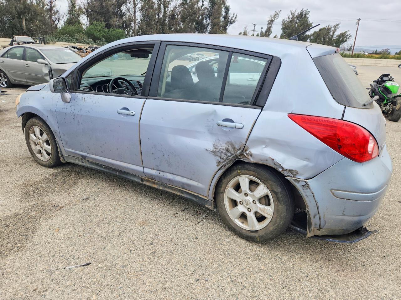 2009 Nissan Versa 1.8 S Blue vin: 3N1BC13E29L407186