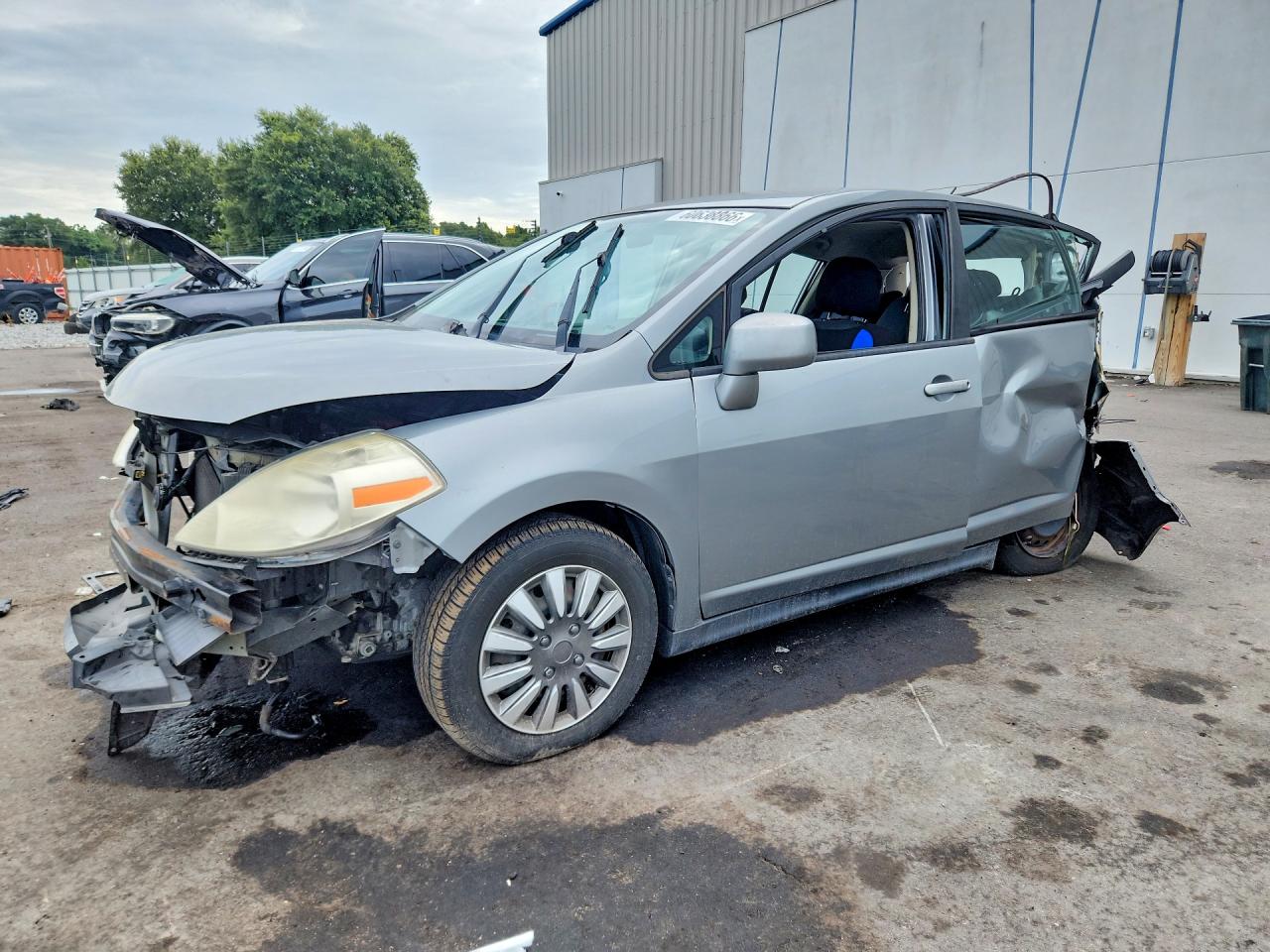 2009 Nissan Versa 1.8 S Серый vin: 3N1BC13E29L485094