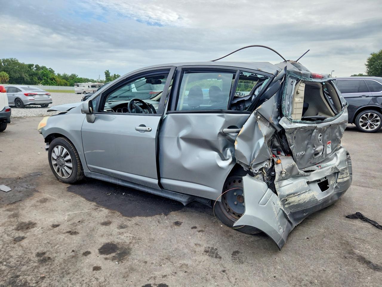 2009 Nissan Versa 1.8 S Серый vin: 3N1BC13E29L485094