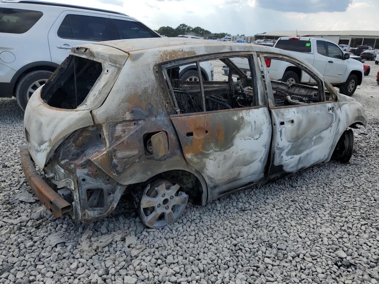 2009 Nissan Versa S Burn vin: 3N1BC13E39L413062
