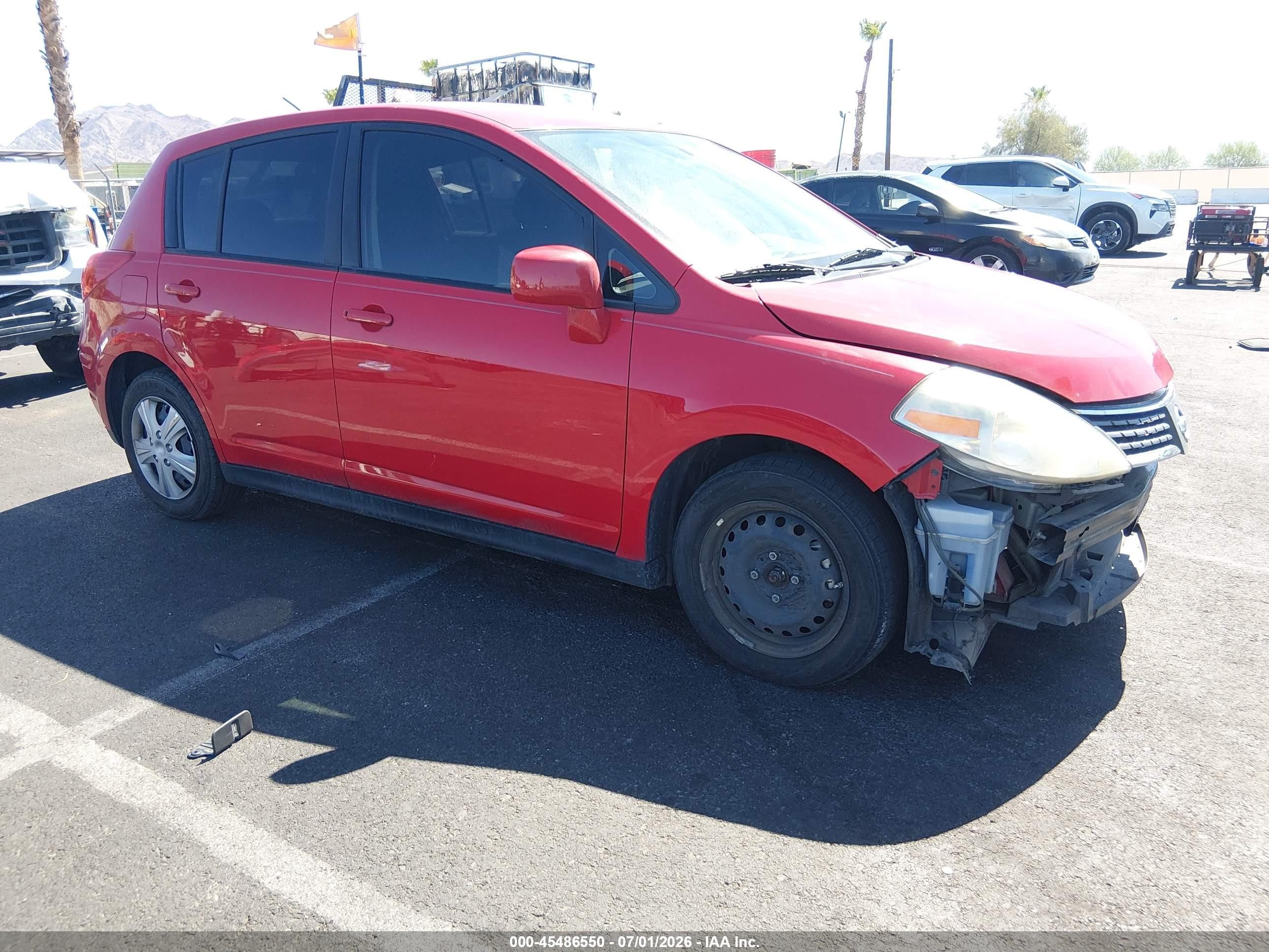 2009 Nissan Versa 1.8s Red vin: 3N1BC13E49L384056