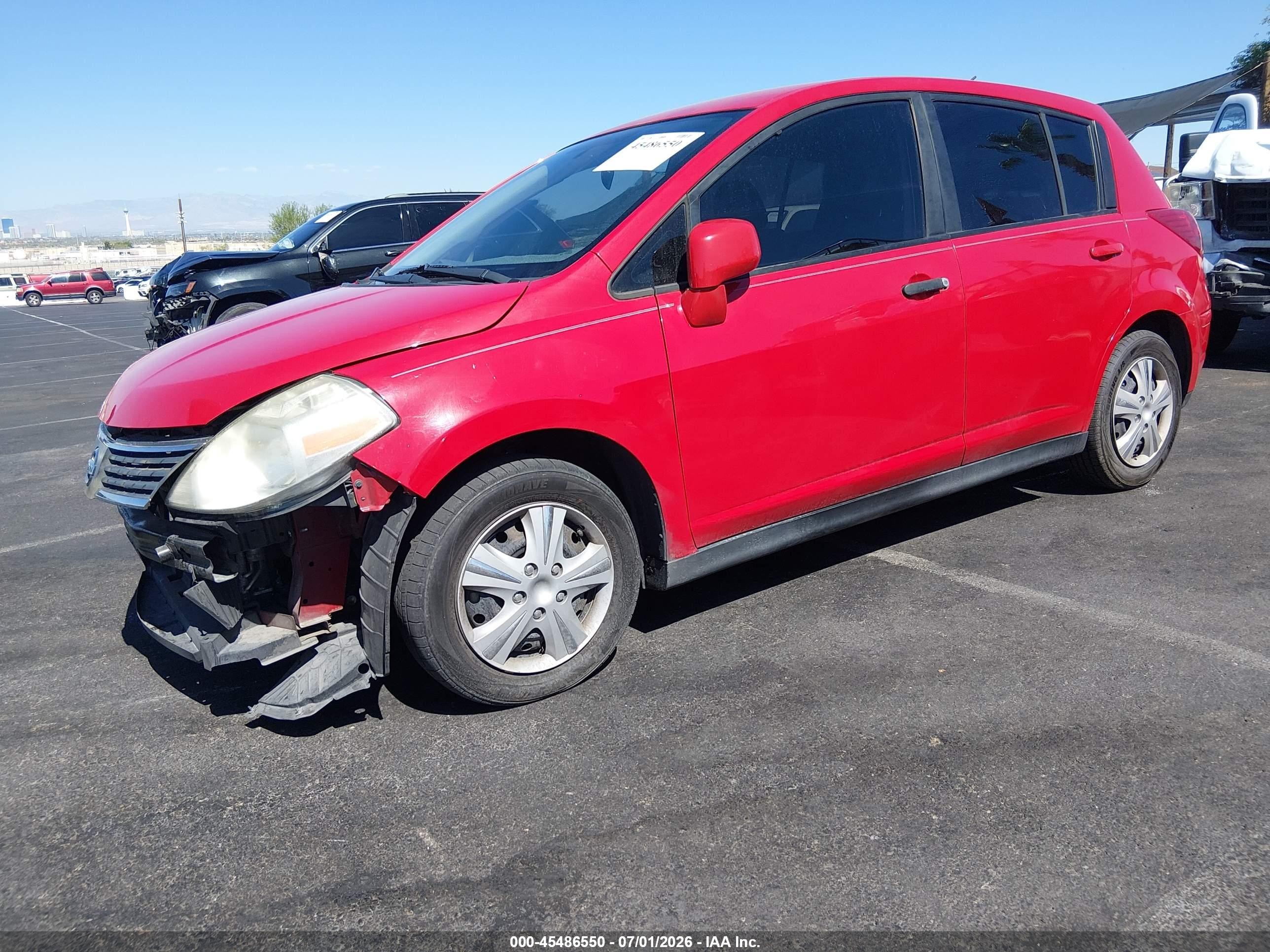 2009 Nissan Versa 1.8s Red vin: 3N1BC13E49L384056