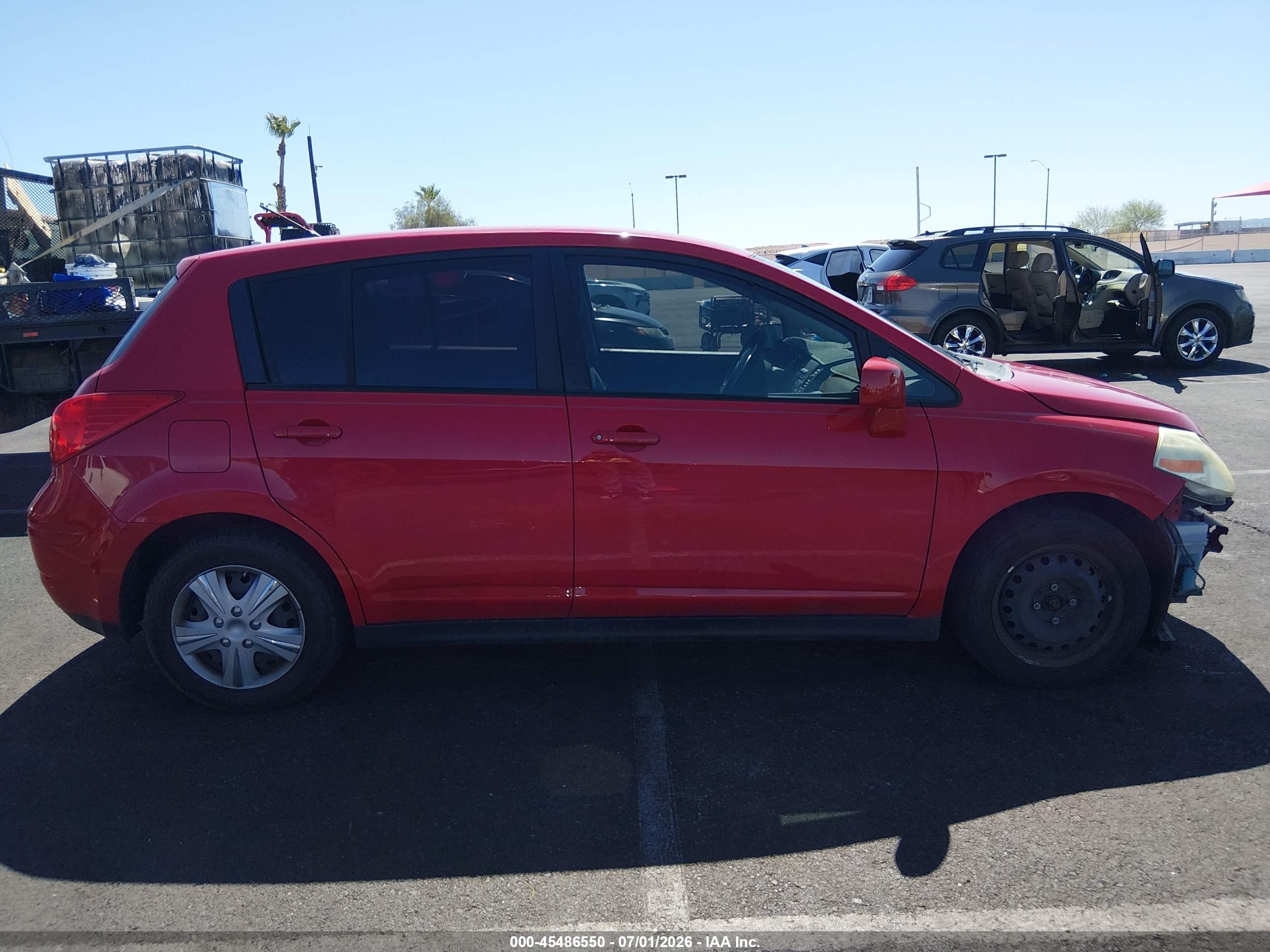 2009 Nissan Versa 1.8s Red vin: 3N1BC13E49L384056