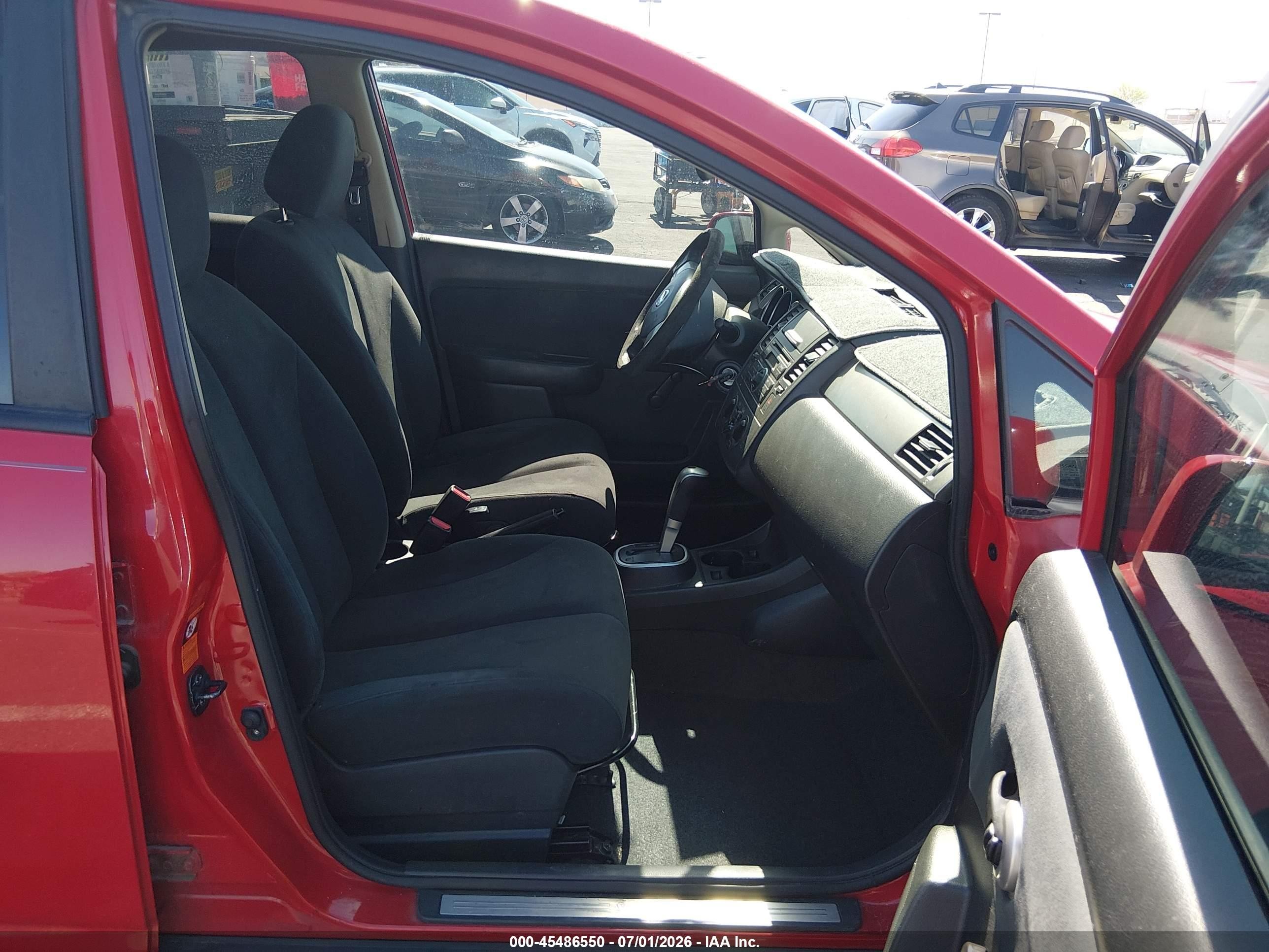 2009 Nissan Versa 1.8s Red vin: 3N1BC13E49L384056