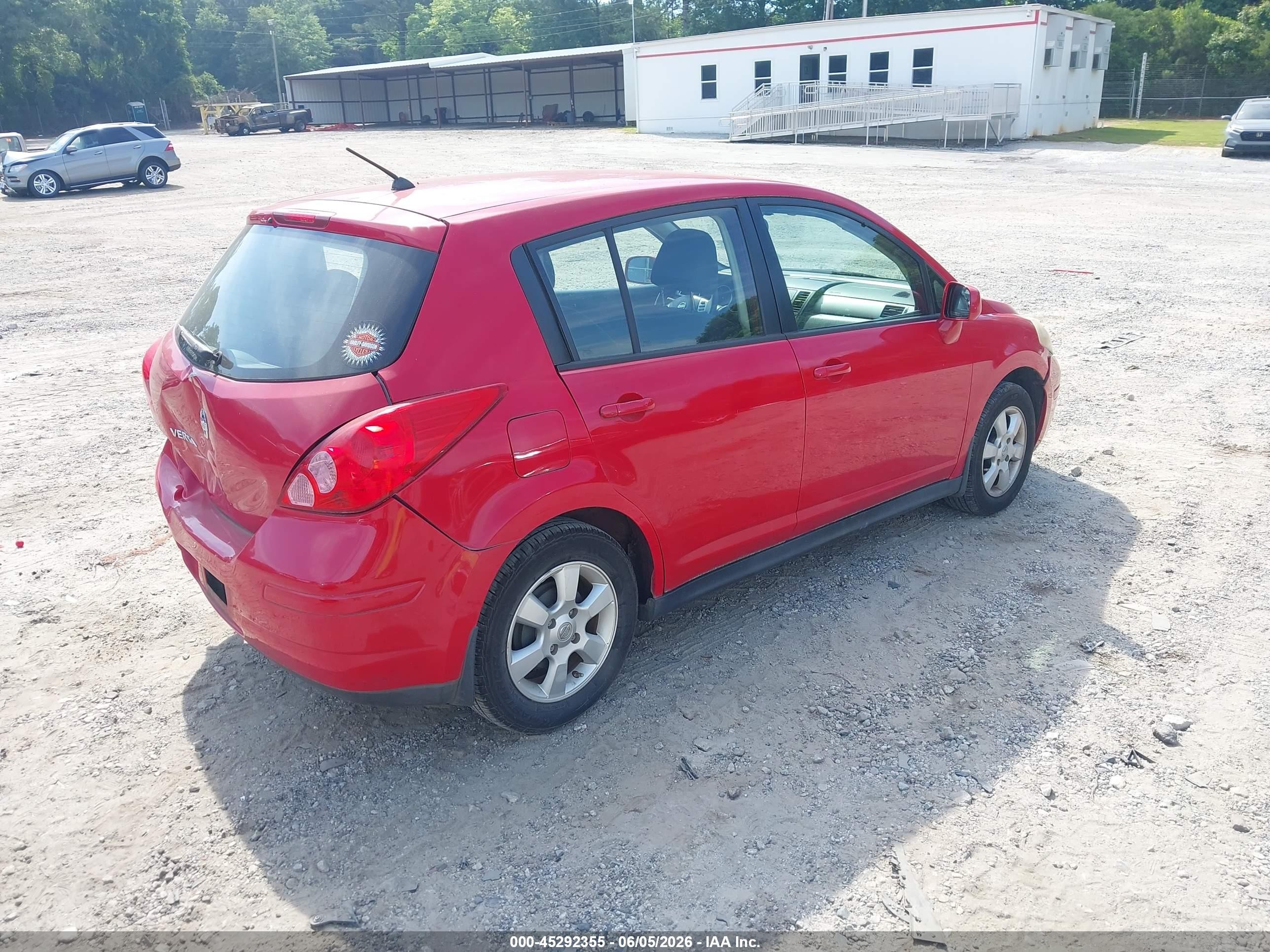 2009 Nissan Versa 1.8s Red vin: 3N1BC13E49L412969