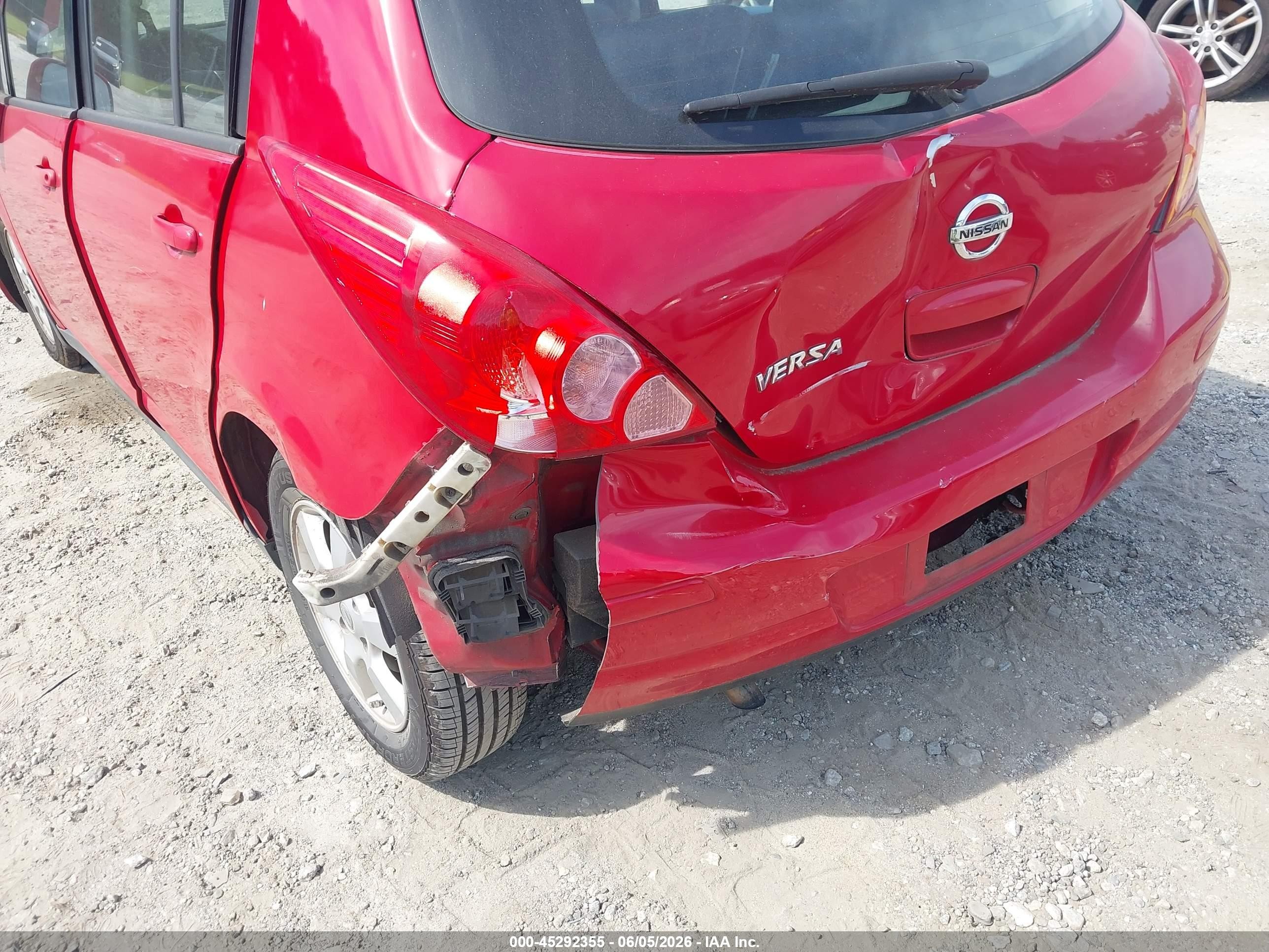 2009 Nissan Versa 1.8s Red vin: 3N1BC13E49L412969