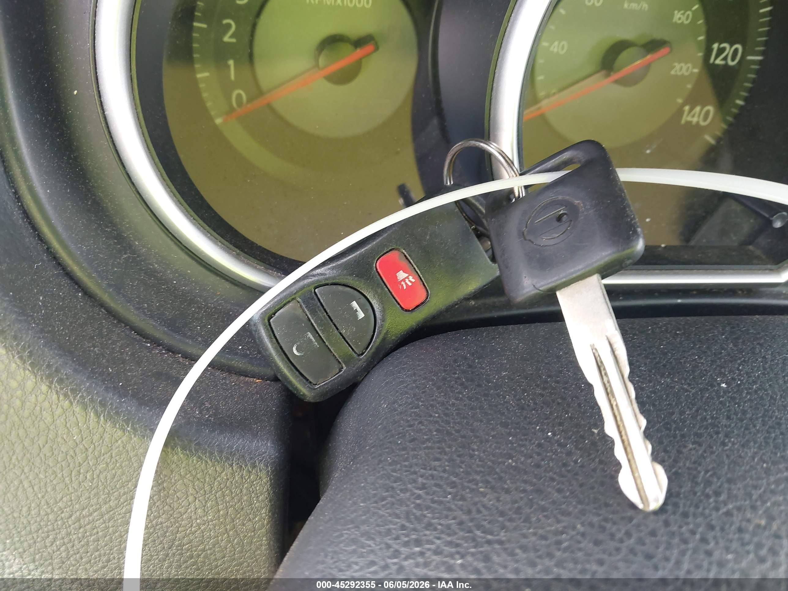 2009 Nissan Versa 1.8s Red vin: 3N1BC13E49L412969