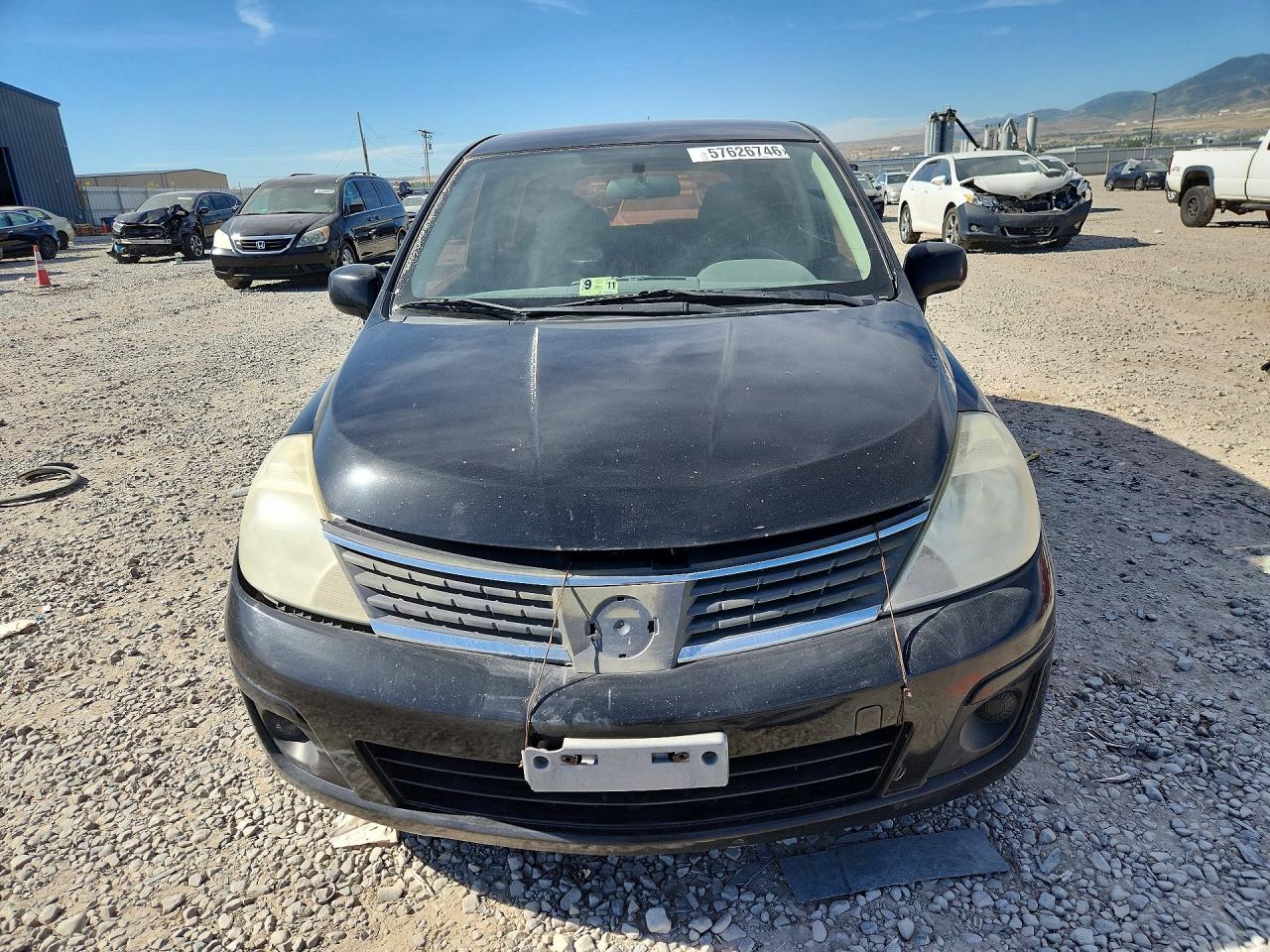 2009 Nissan Versa 1.8 S Черный vin: 3N1BC13E49L477157