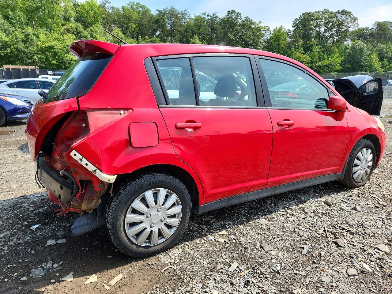2009 Nissan Versa 1.8 S Red vin: 3N1BC13E59L383336