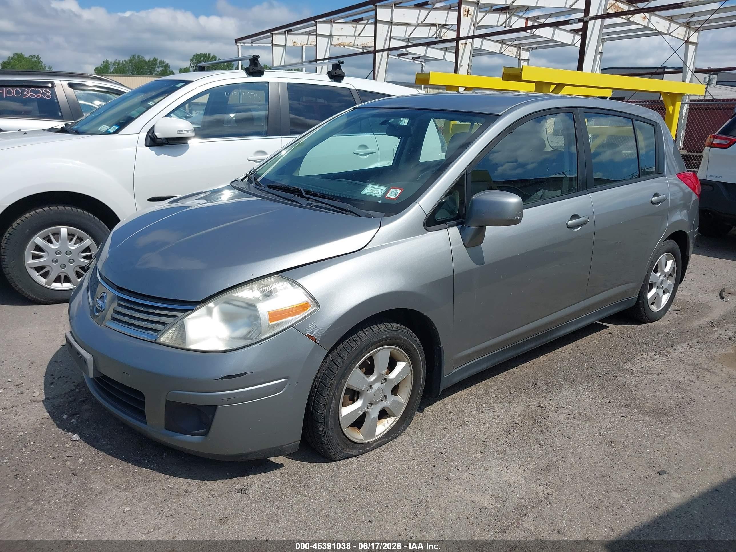 2009 Nissan Versa 1.8sl Серебряный vin: 3N1BC13E59L405741