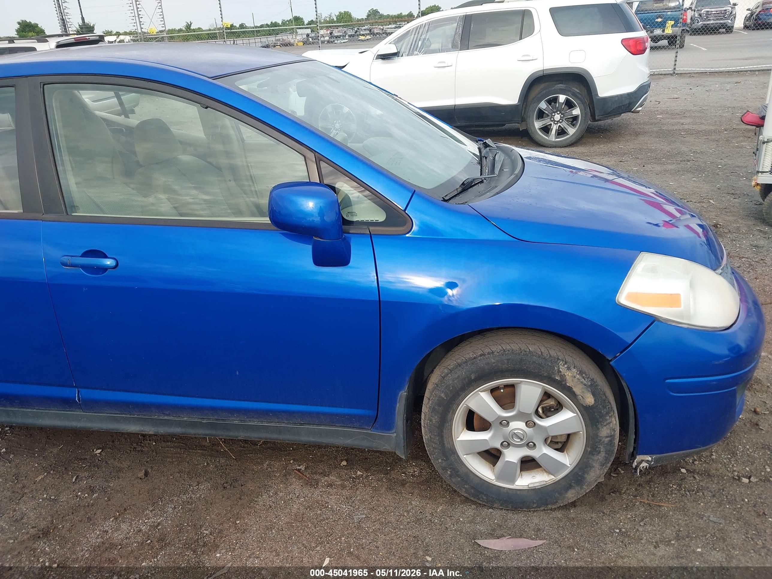 2009 Nissan Versa 1.8sl Blue vin: 3N1BC13E69L408339