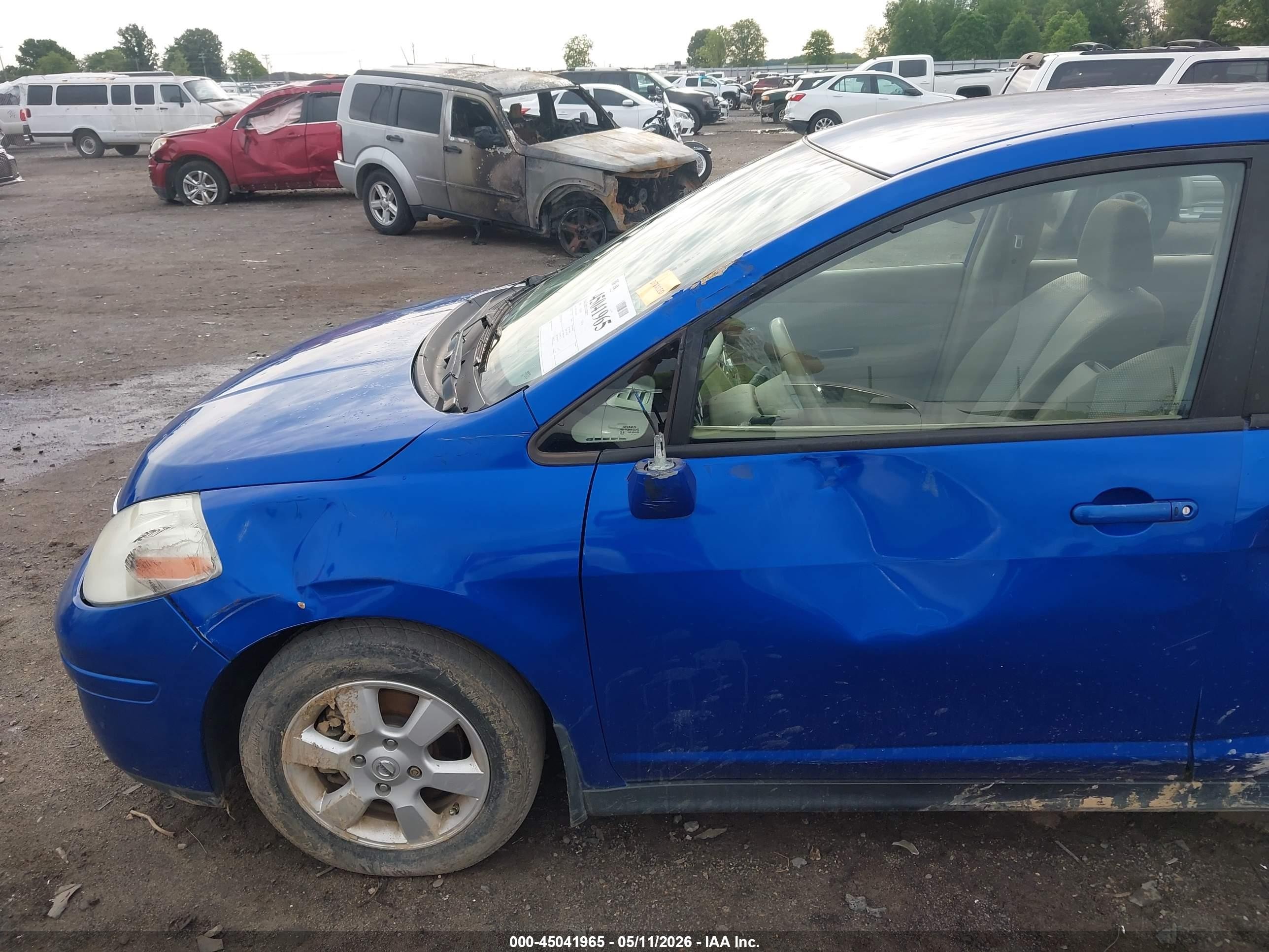 2009 Nissan Versa 1.8sl Blue vin: 3N1BC13E69L408339