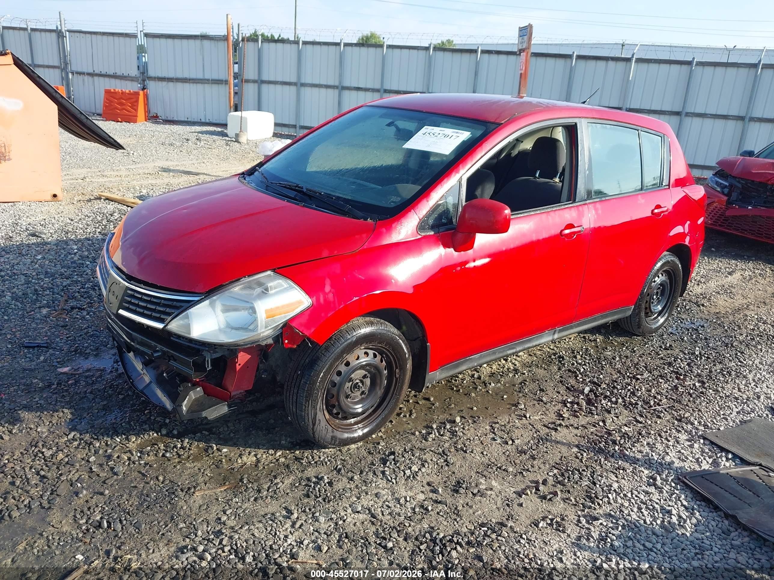 2009 Nissan Versa 1.8s Red vin: 3N1BC13E79L479601
