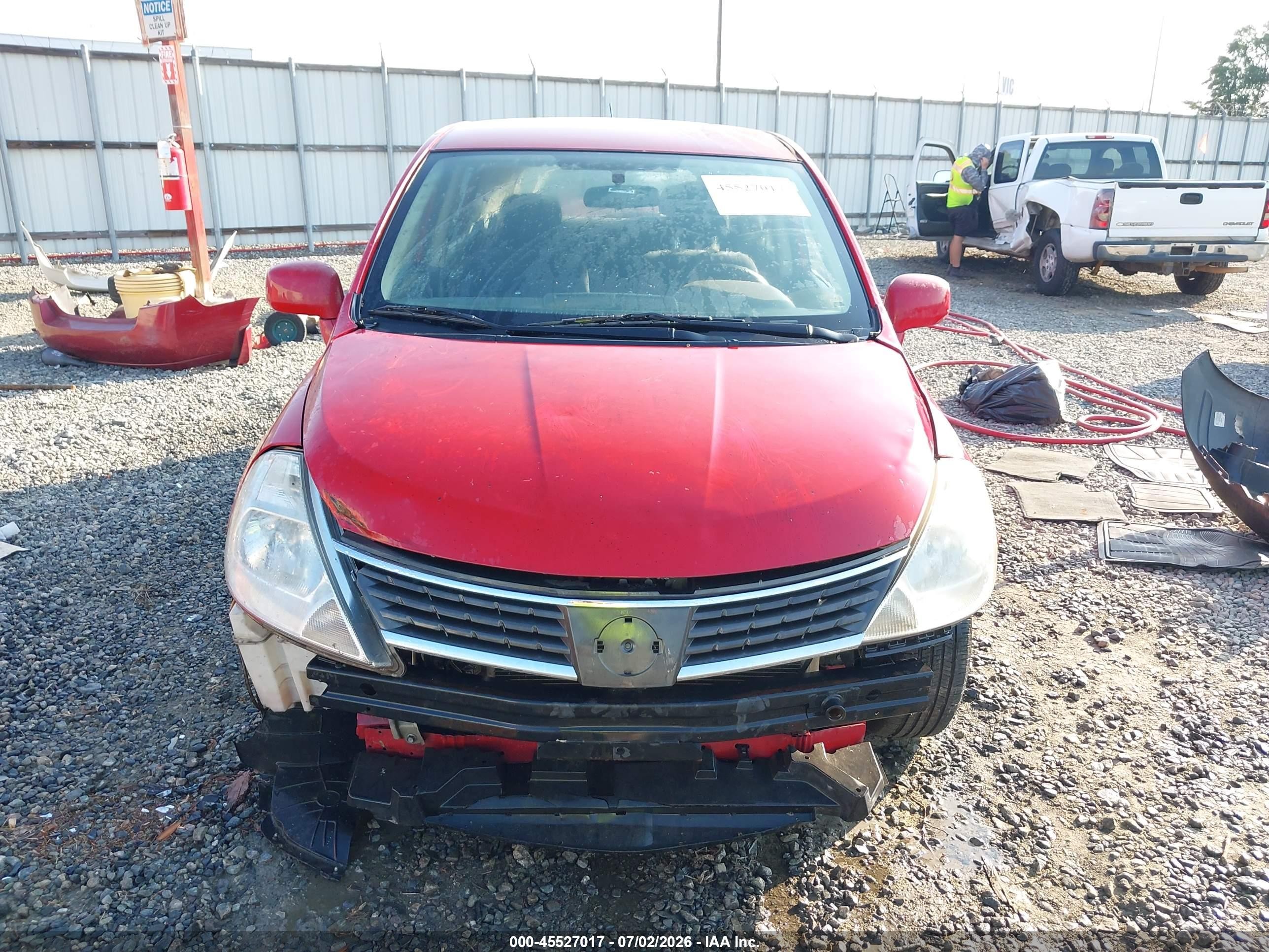 2009 Nissan Versa 1.8s Red vin: 3N1BC13E79L479601