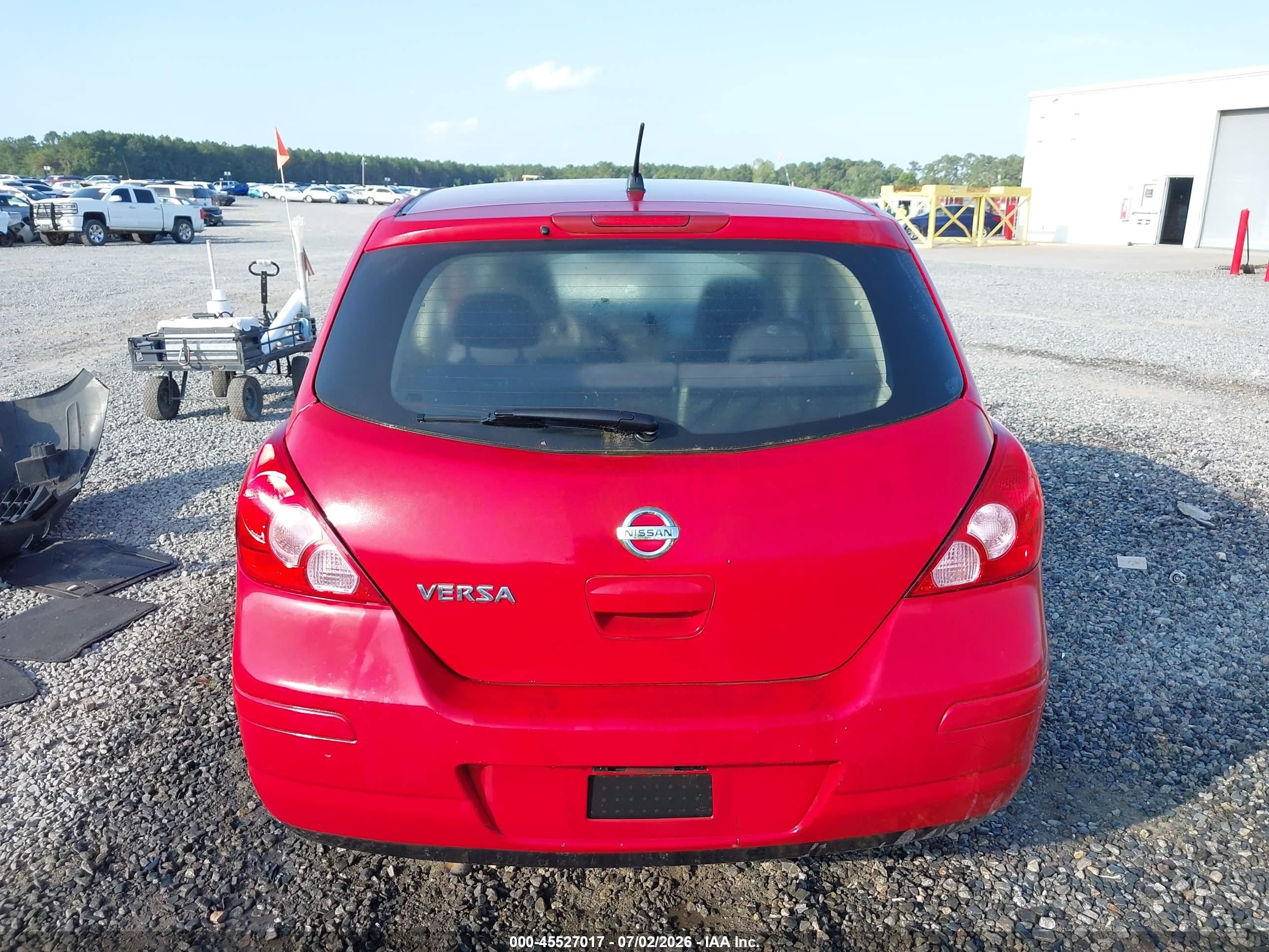 2009 Nissan Versa 1.8s Red vin: 3N1BC13E79L479601