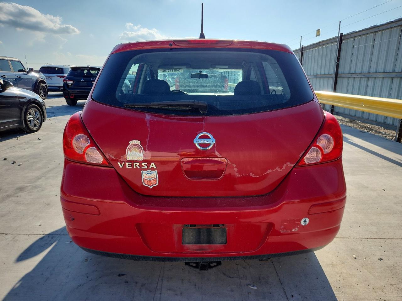 2009 Nissan Versa 1.8 S Red vin: 3N1BC13EX9L388130
